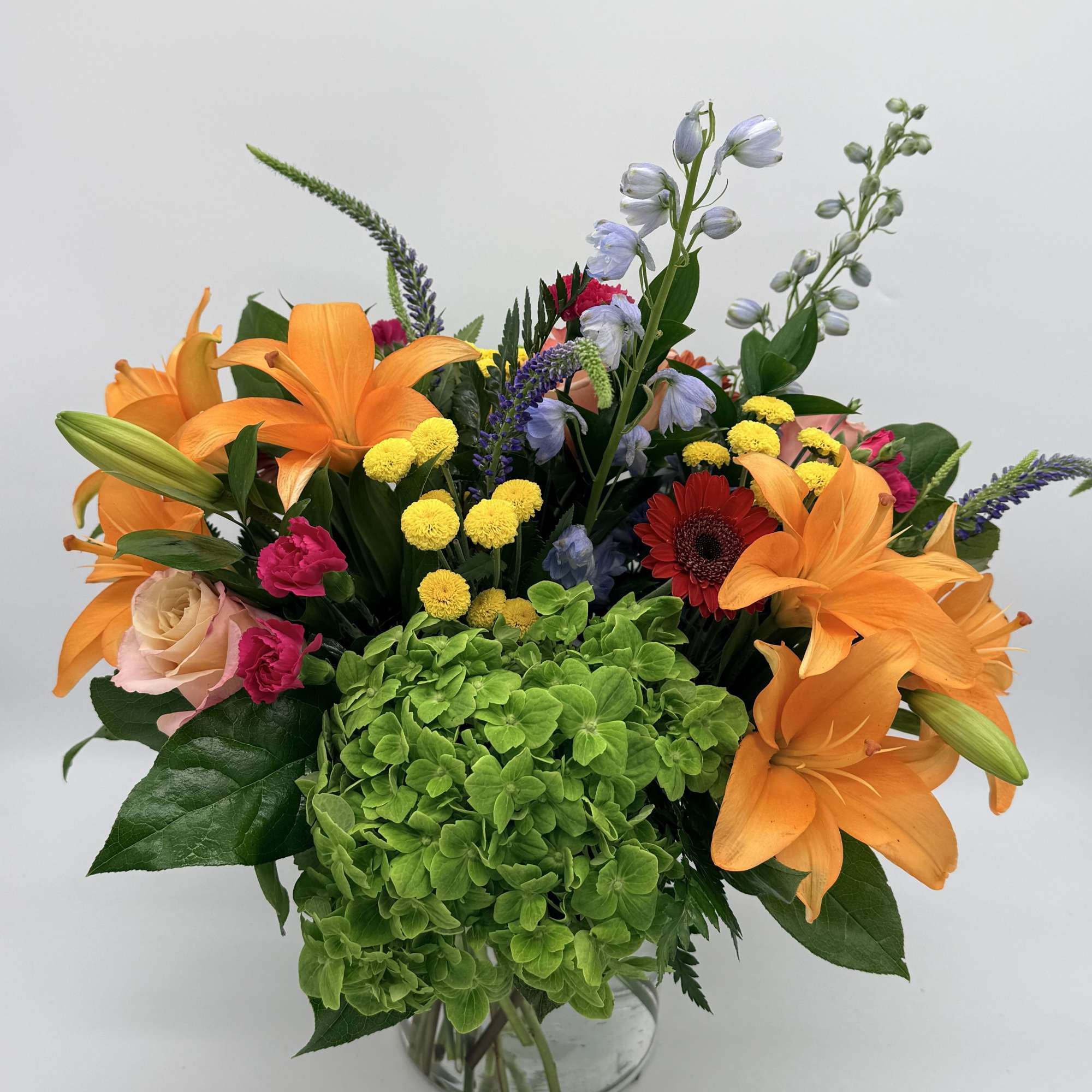 Celebrating life with colorful blooms that inspire and delight, this flower bouquet