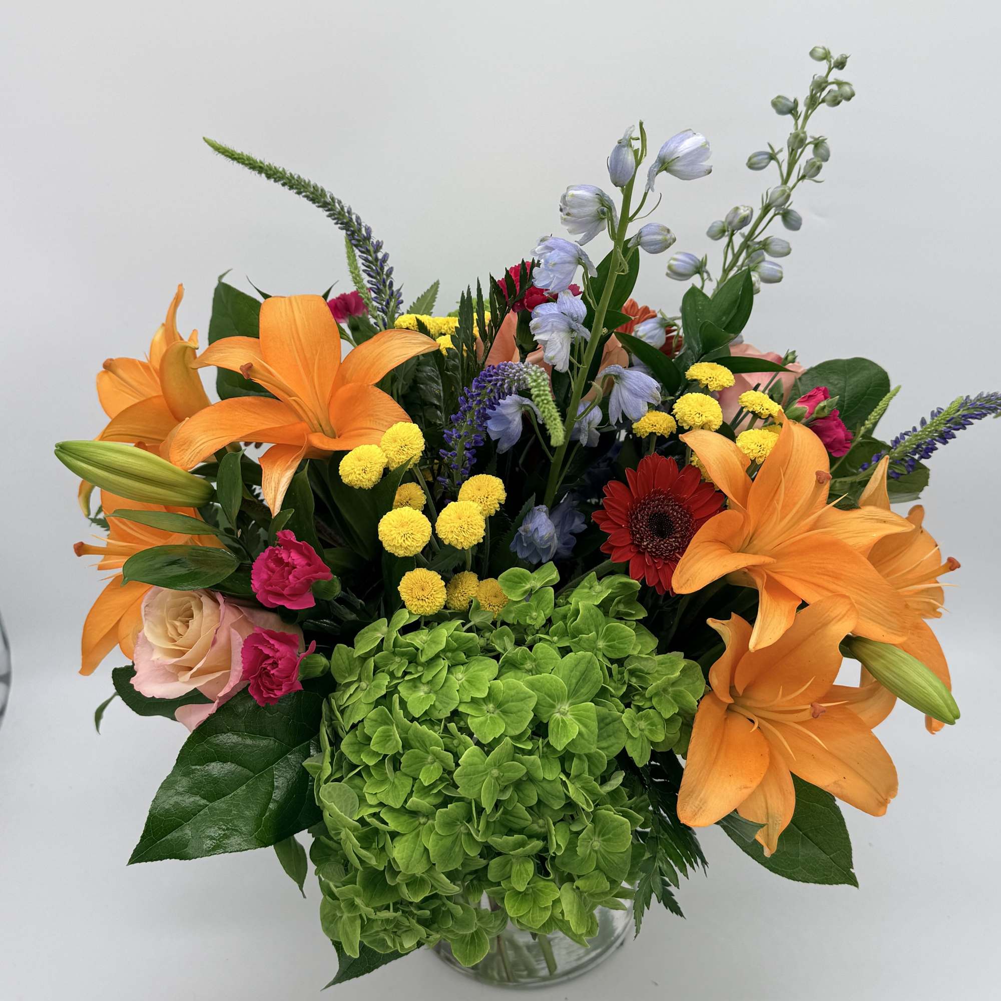 Celebrating life with colorful blooms that inspire and delight, this flower bouquet