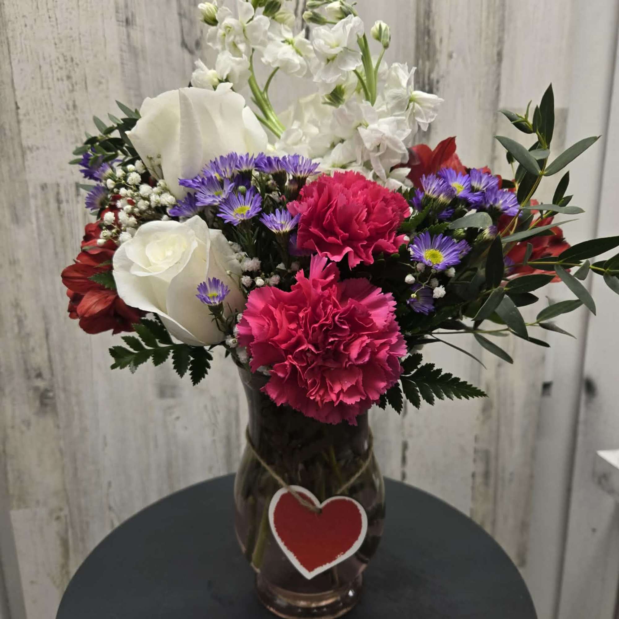 Nice and Bright Valentines Arrangement. Red vase Or Pink Vase. White roses