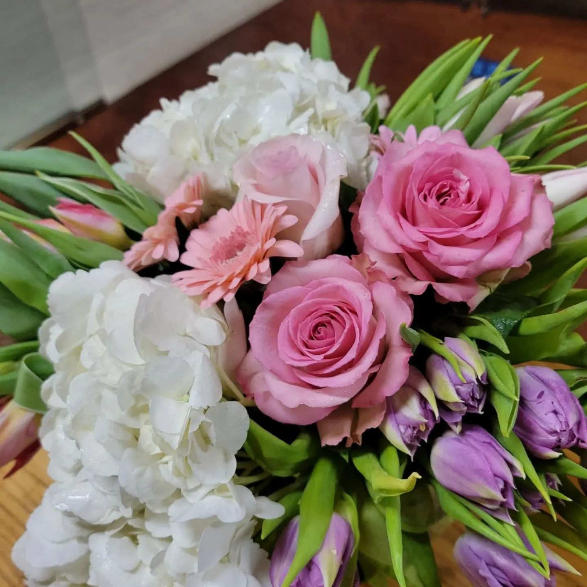 This beautiful, compact arrangement, is stunning! The colors are designer's choice but