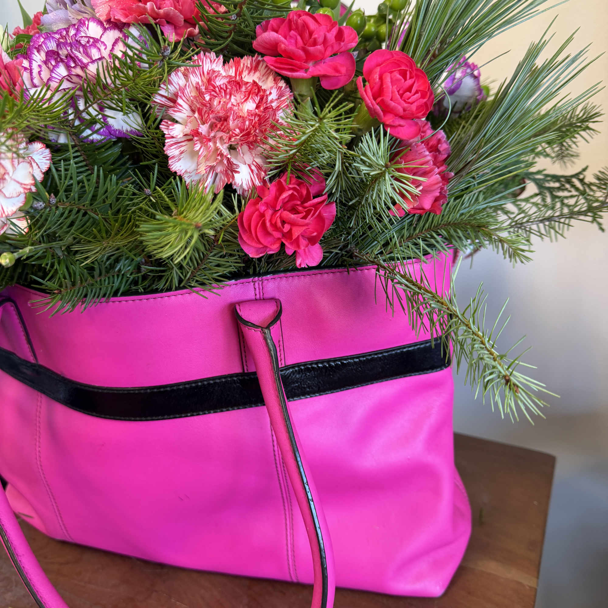 A trendy, stylish,  flower display arranged in a gift!! 

The gift