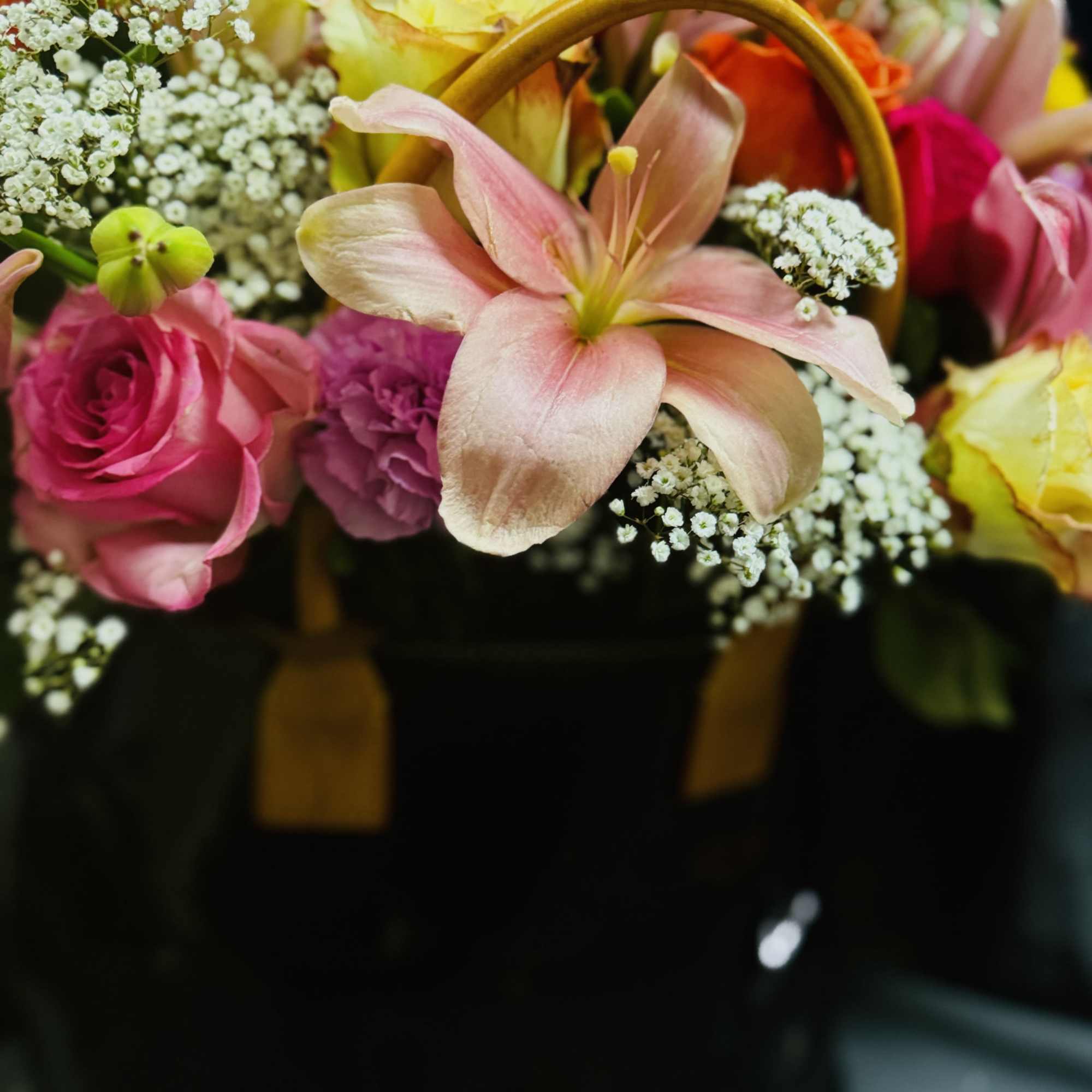 A trendy, stylish,  flower display arranged in a gift!! 

The gift