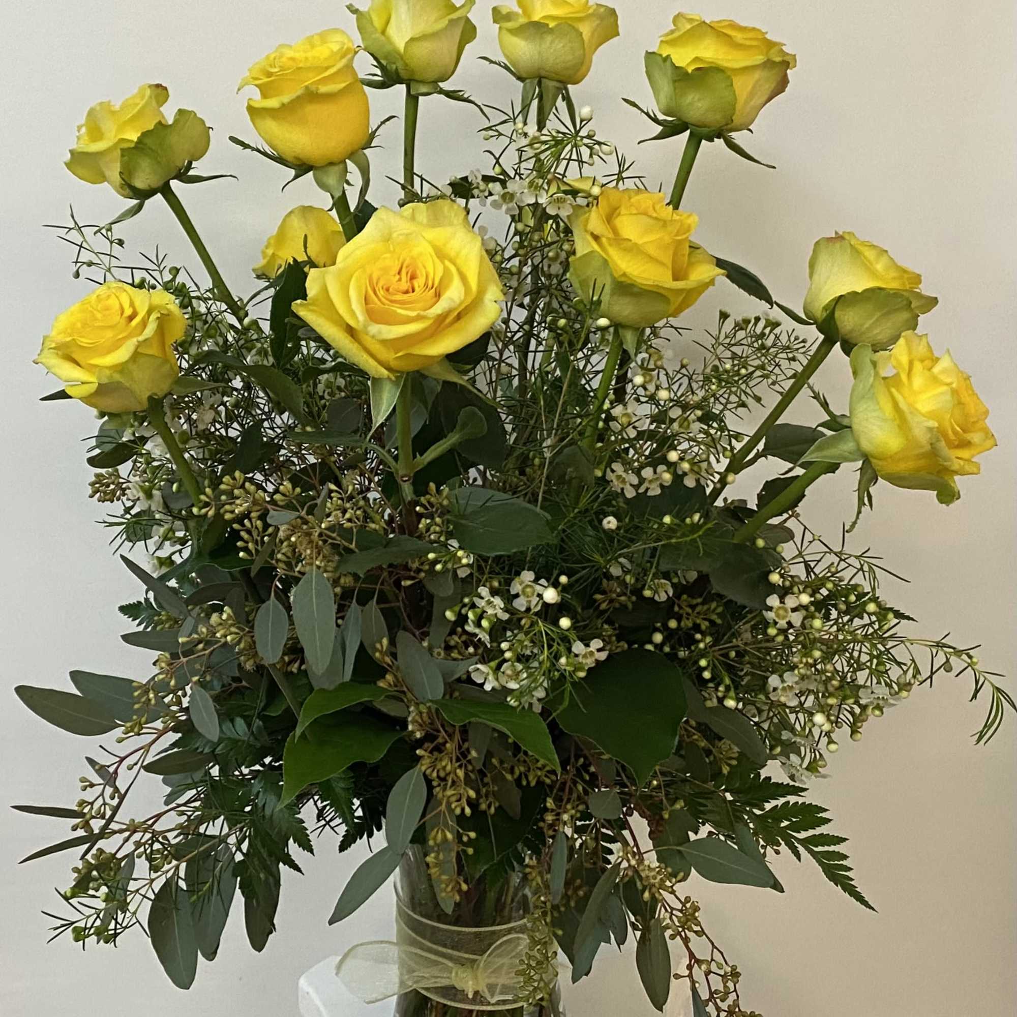 Yellow roses can have many meanings. A bouquet of a dozen yellow