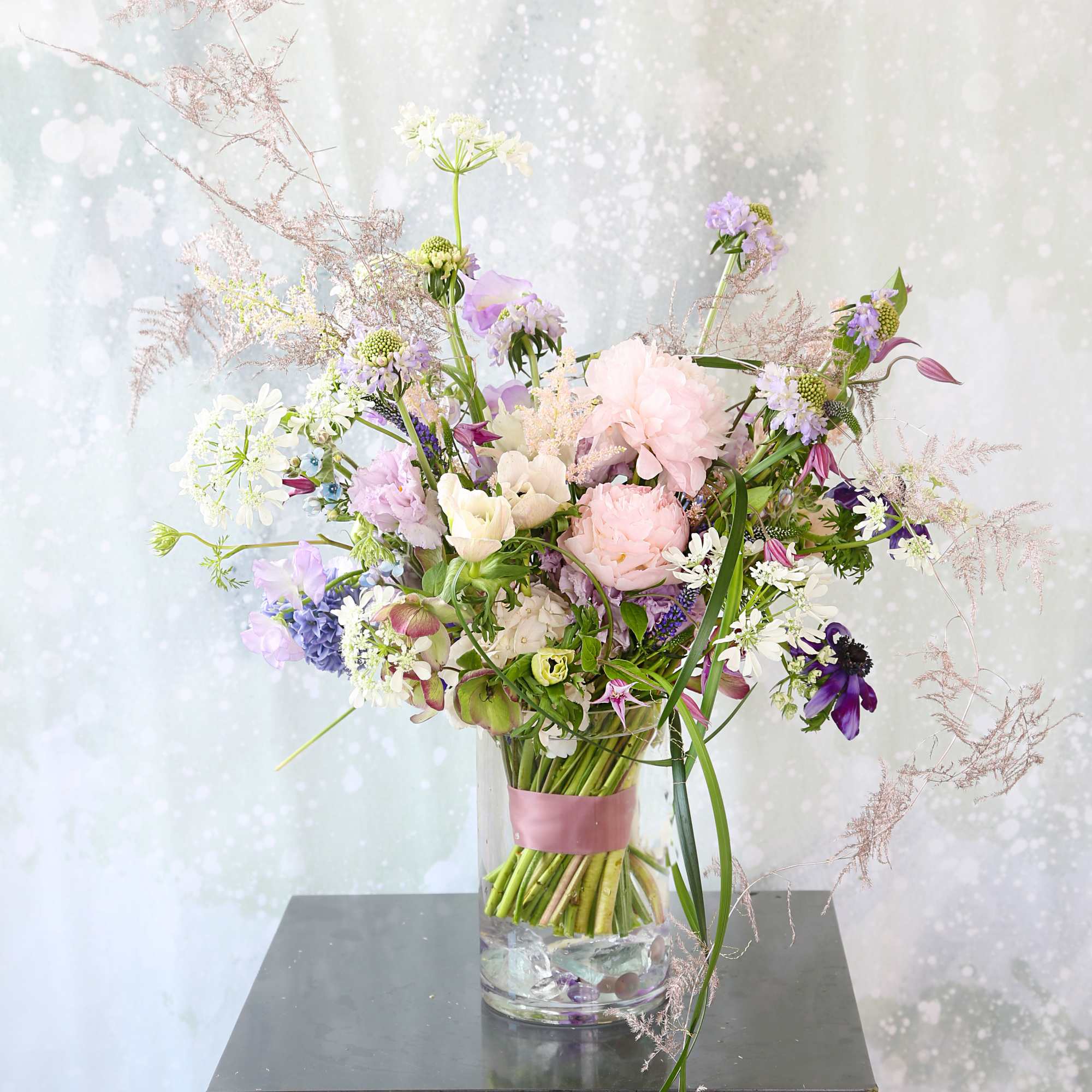 A soft Blush Ivory color palette create with Peony, Anemone, and seasonal