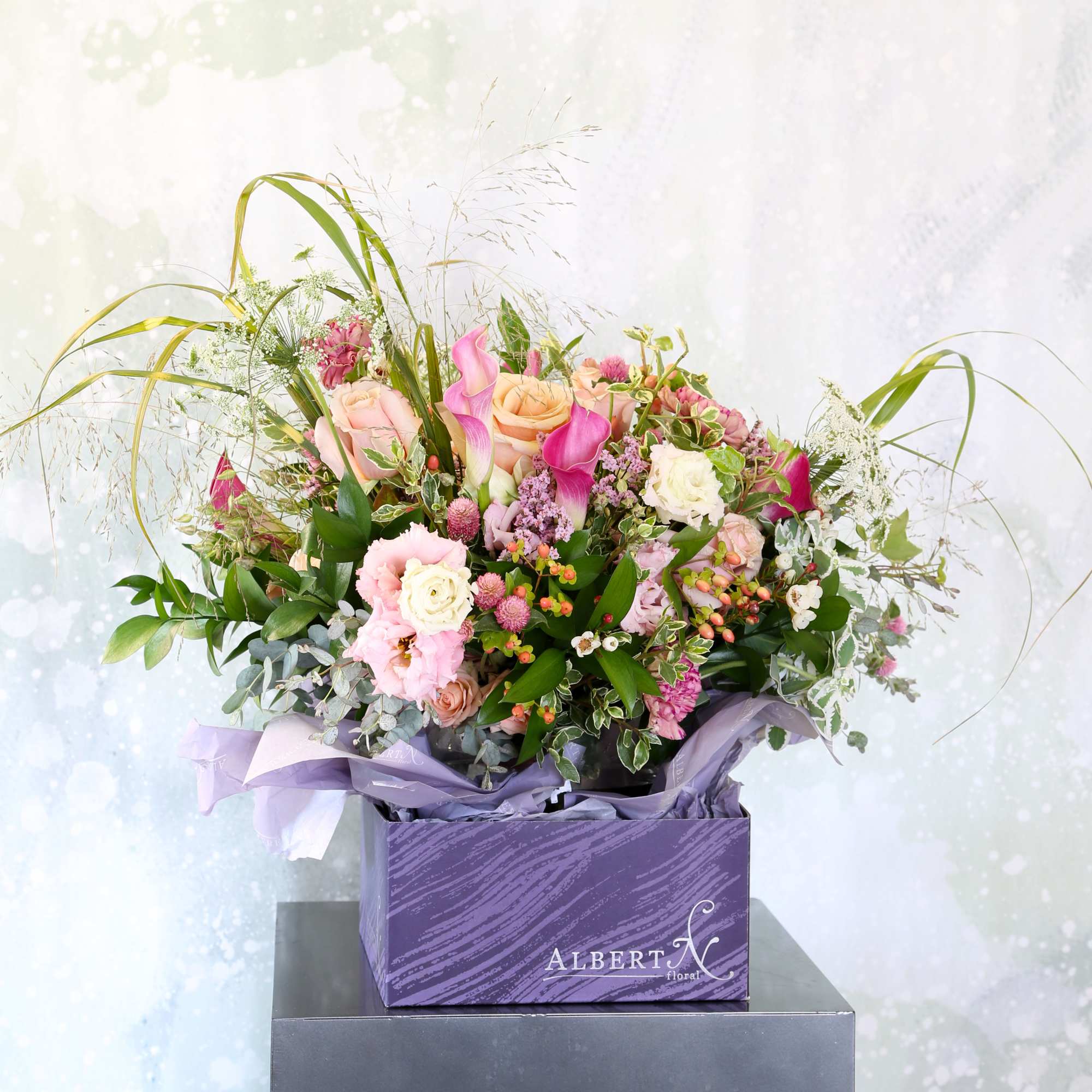A Luxury Mix Boquet arrange with garden Rose, Calla lillies, Lisianthus, carnation