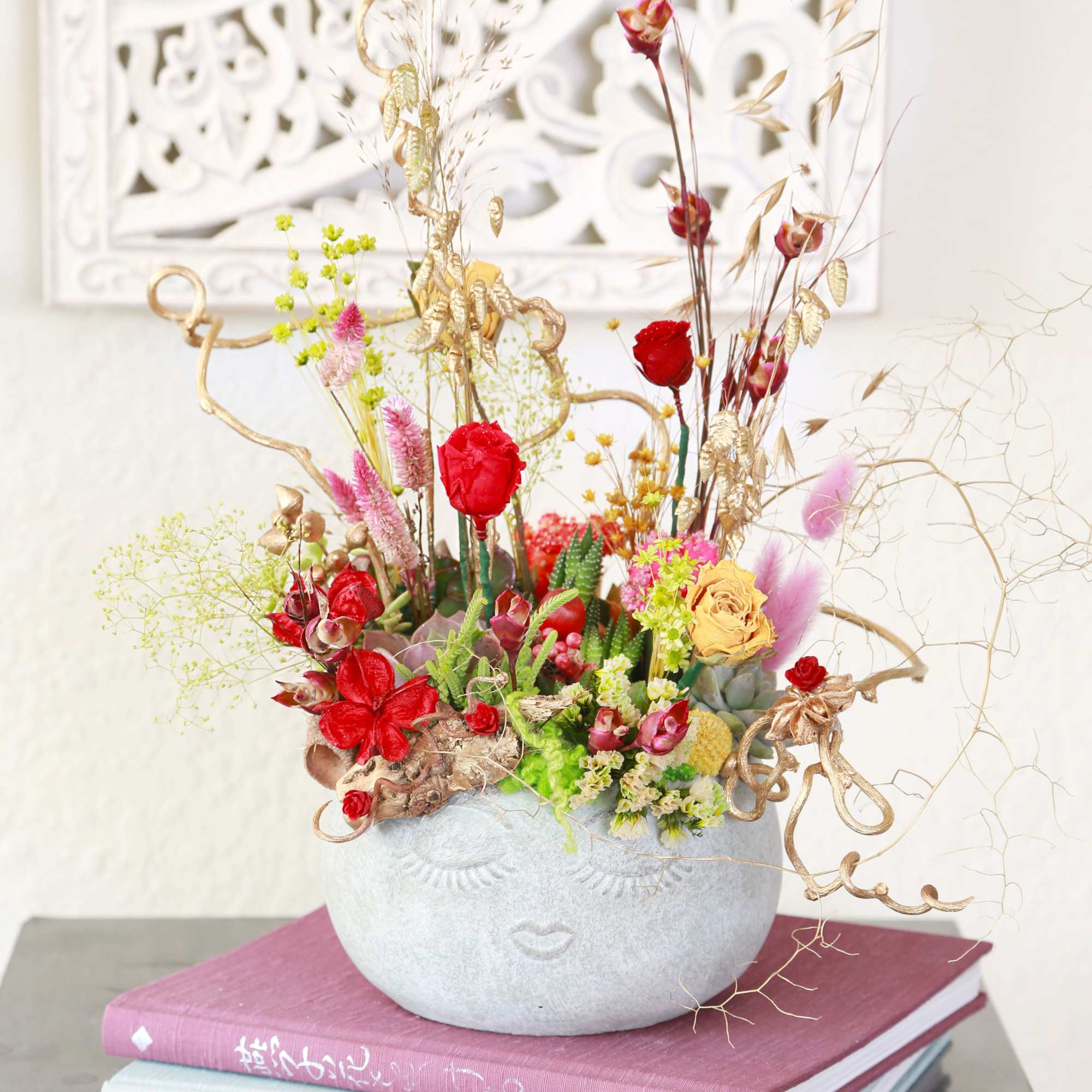 Our bestselling Assorted Succulent arranged in 7" Smile face ceramic seafoam color