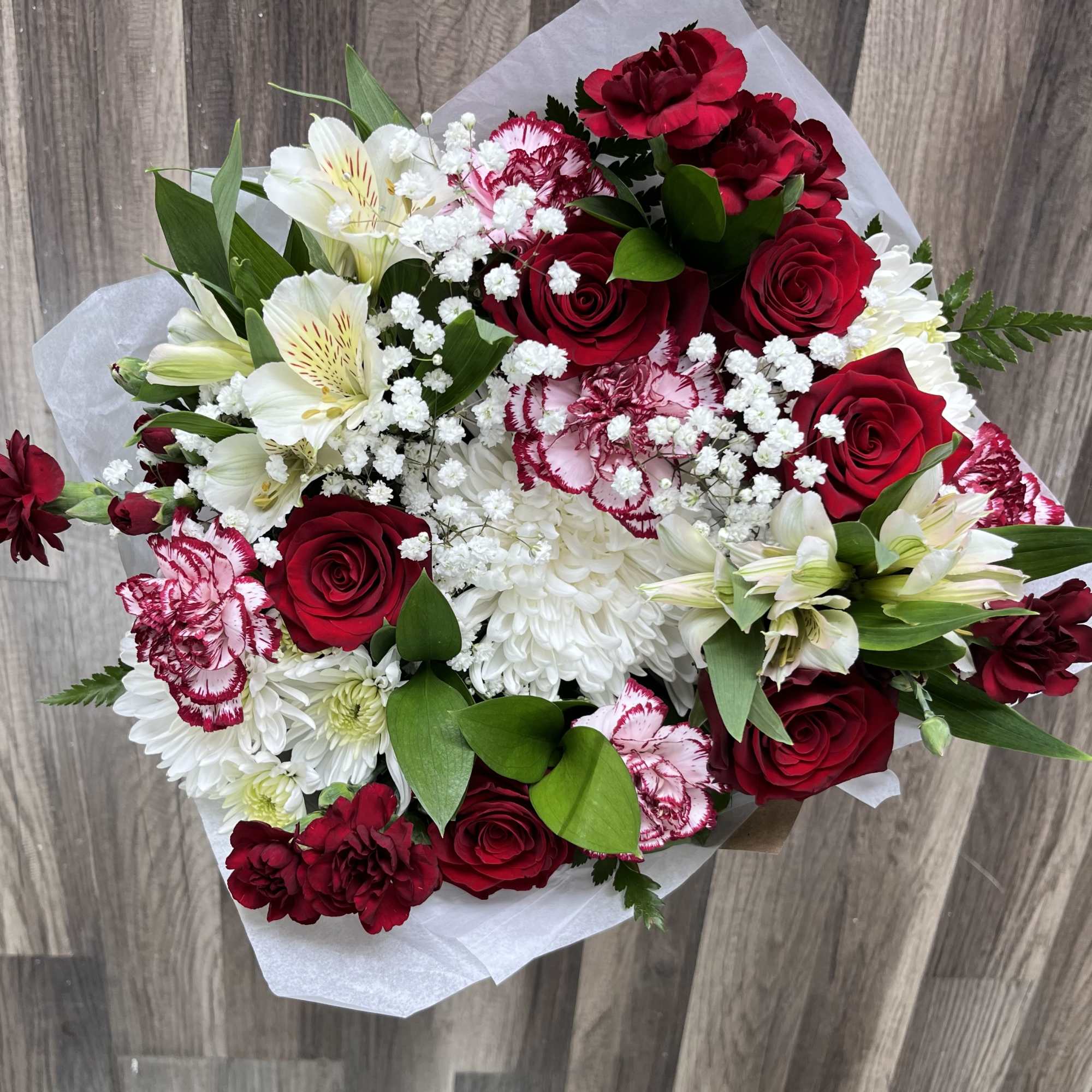 The freshest blooms of the day in tones of red and white