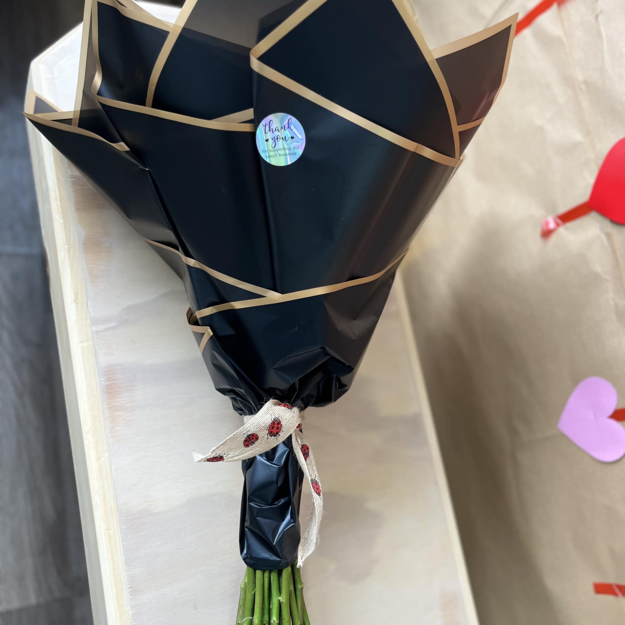 Bouquet of 24 premium long stem Red Roses can be done in