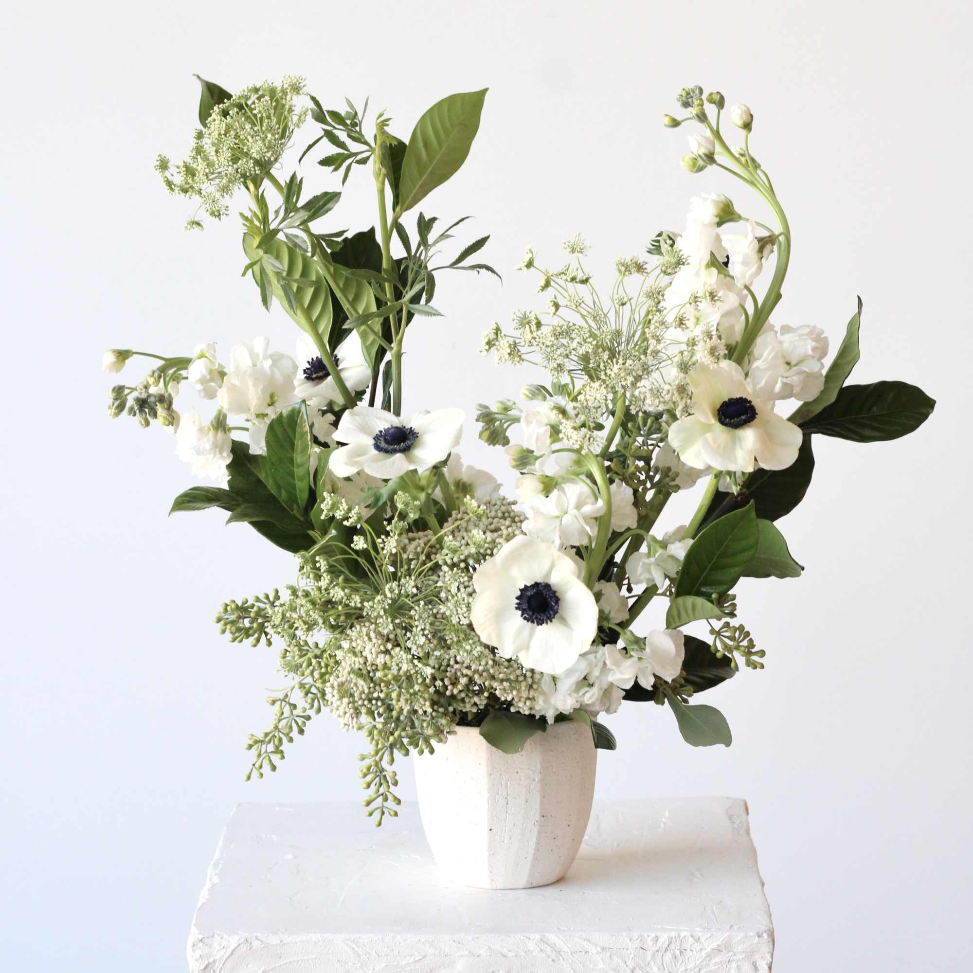 Welcome the effortless elegance and timeless beauty of our Modern Neutral Arrangement.