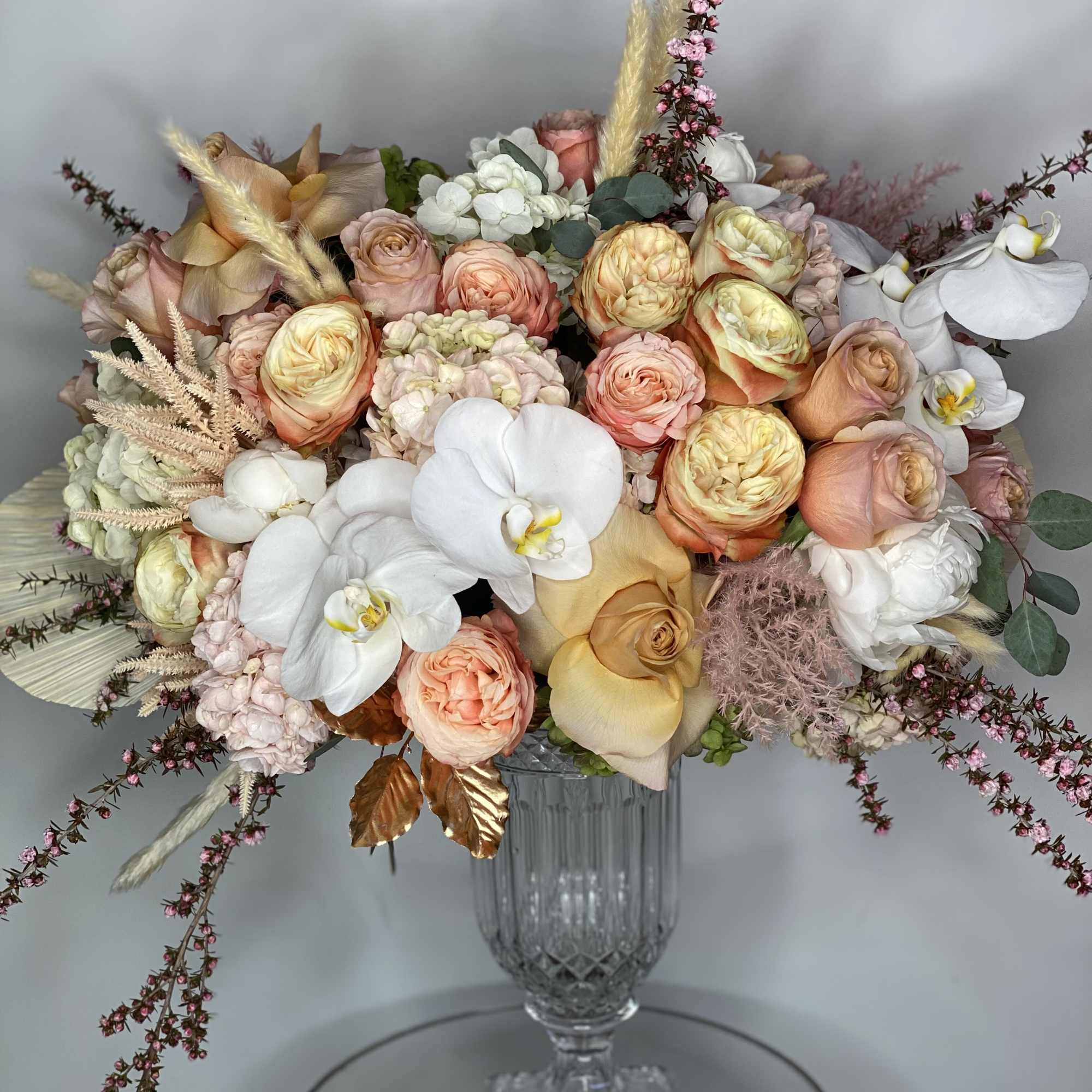 Crystal vase, grounded neutrals, with a lot to say- a mother/grandmother favorite.