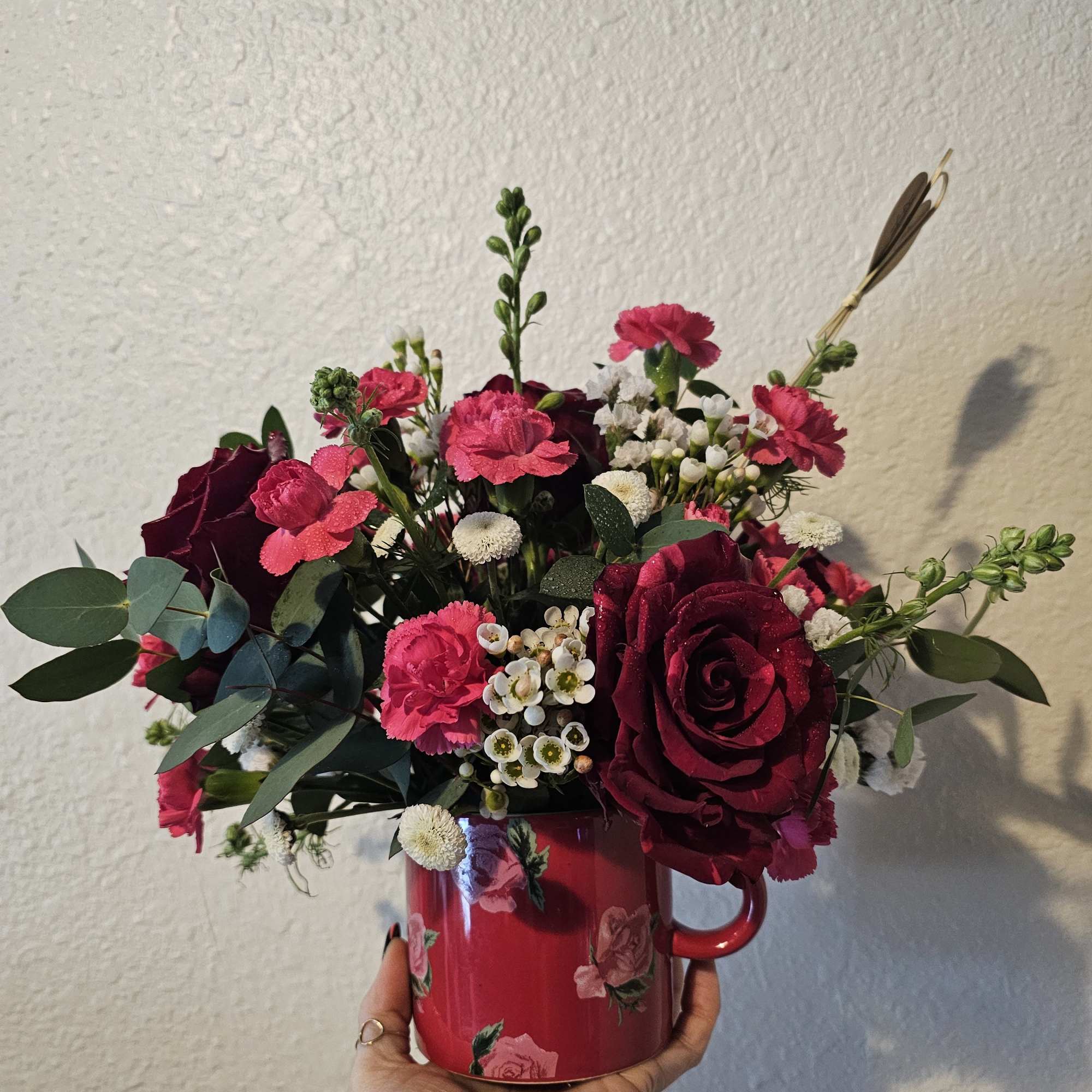 Beautiful petite bouquet in a unique and usable mug. Makes a great