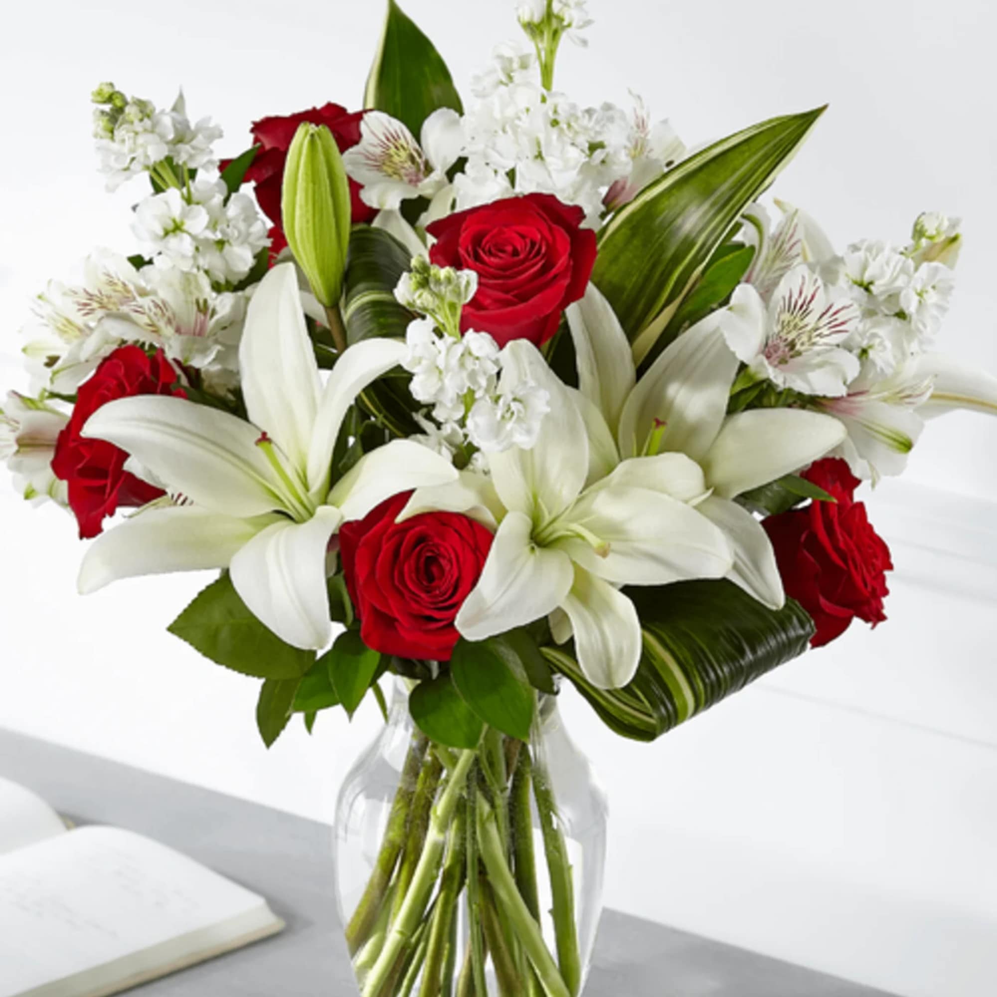 Standard bouquet is approximately 19"H x 15"W. DELUXE bouquet is approximately 19"H