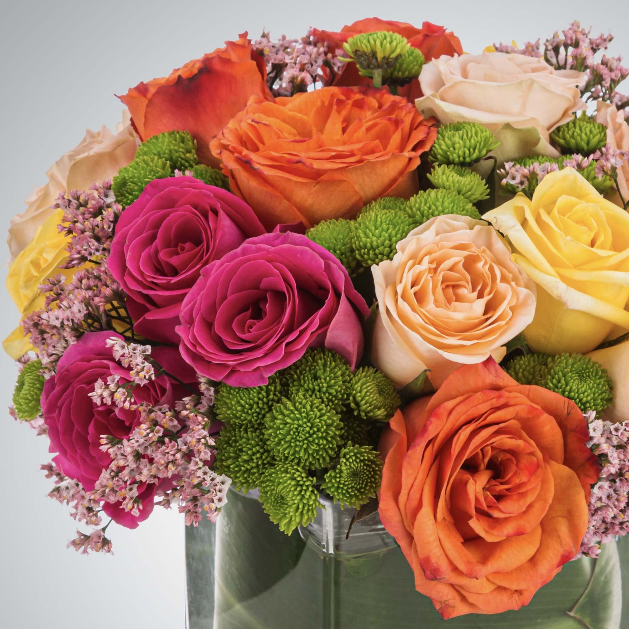 A mixed bouquet full of roses in a Kaleidoscope of colors! A