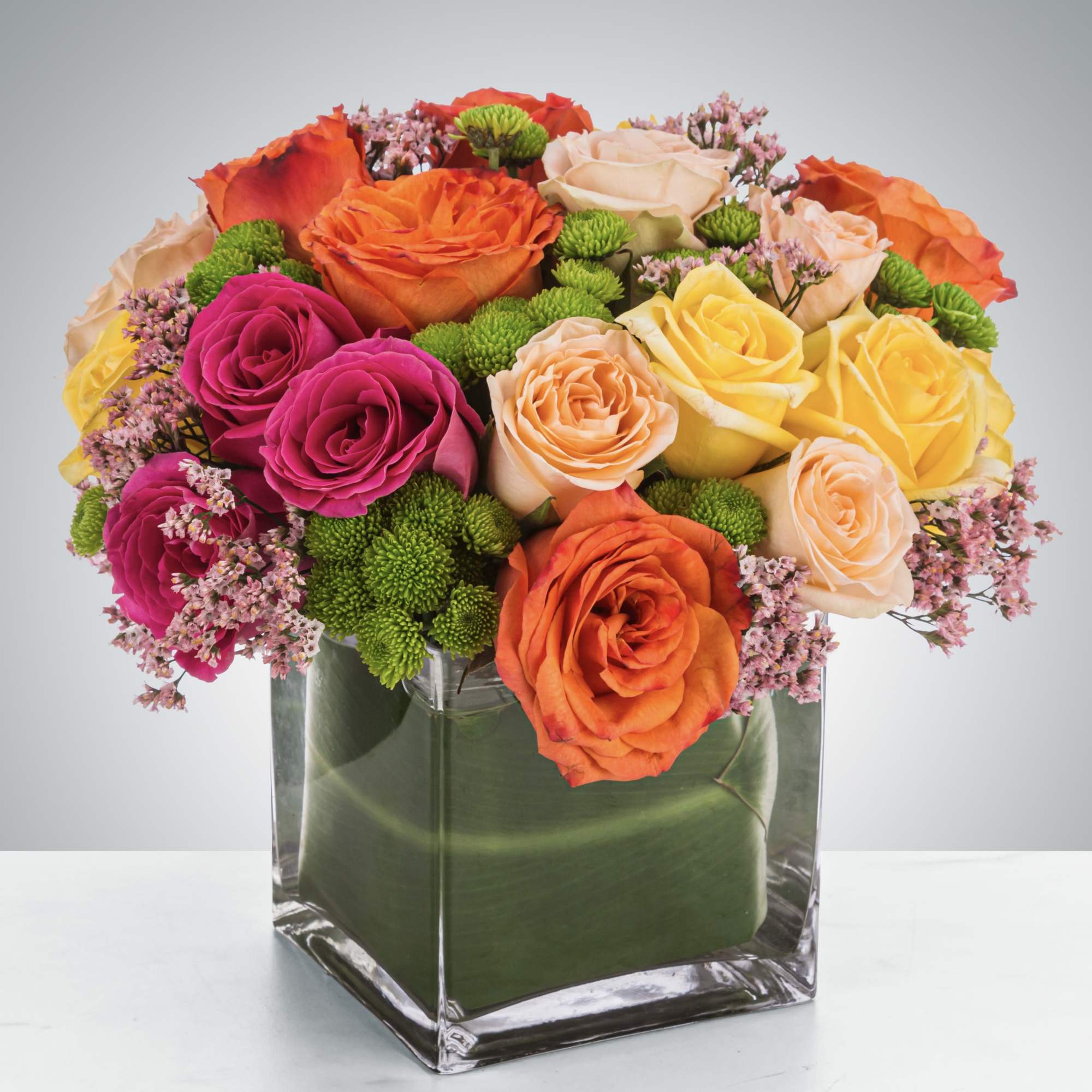 A mixed bouquet full of roses in a Kaleidoscope of colors! A