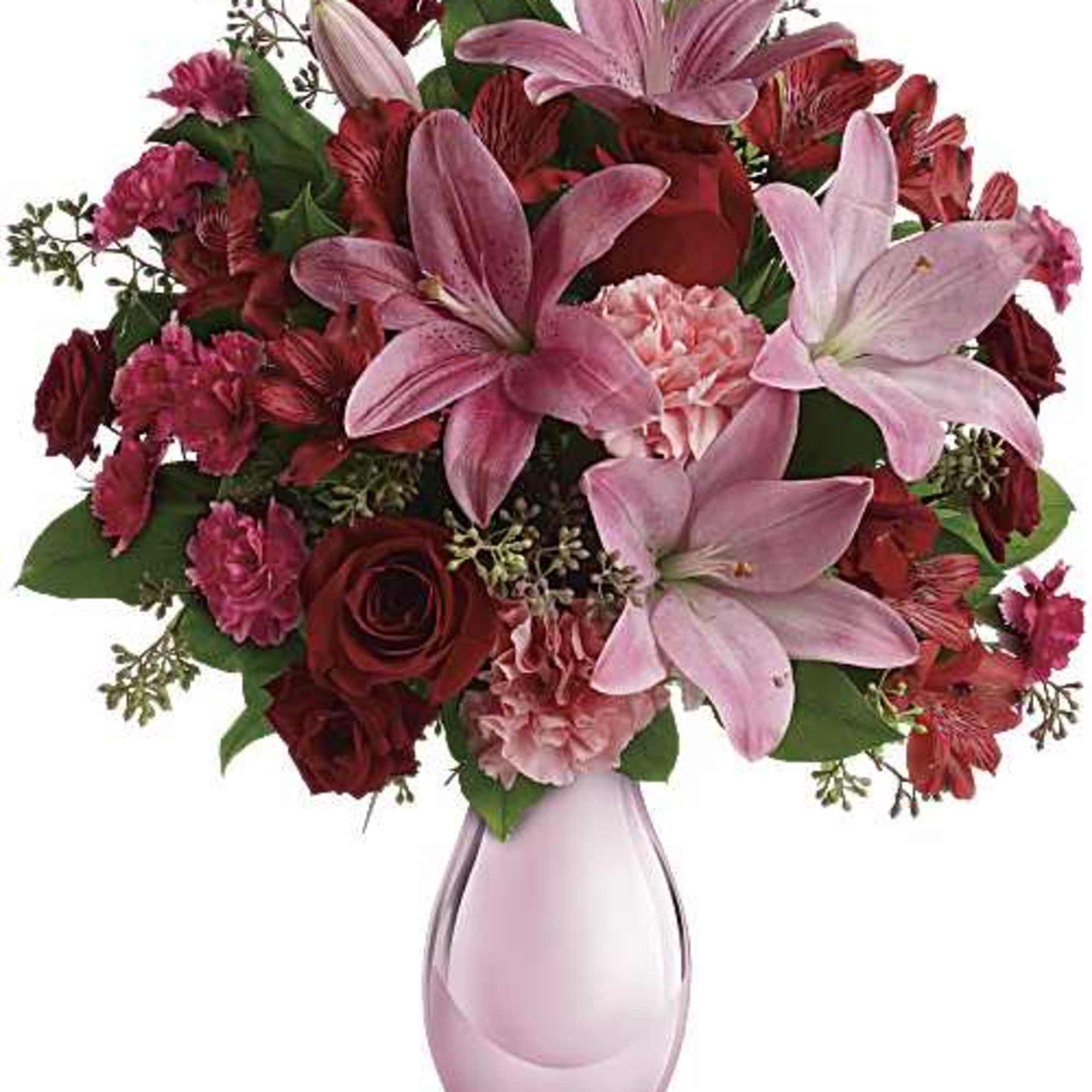 A graceful blend of rich red roses, soft pink lilies, and delicate