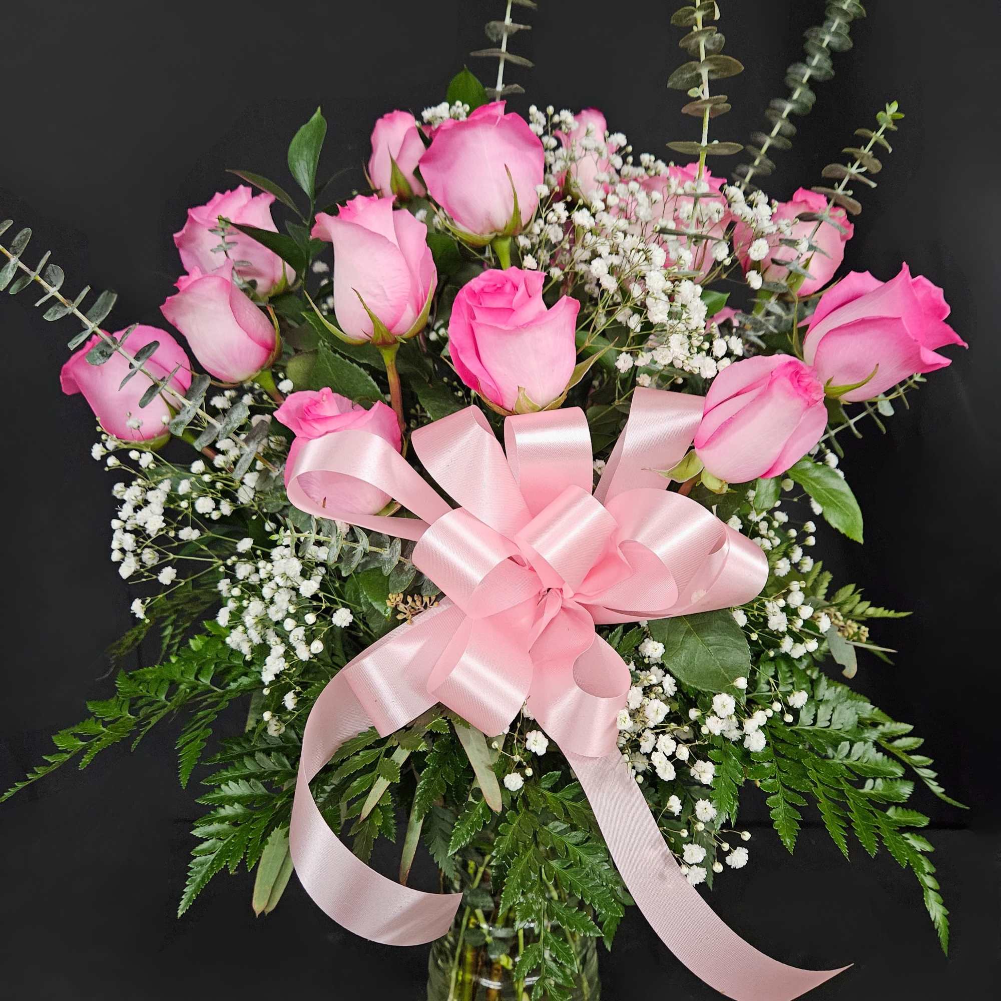 These pink roses are cheerful and fun! Dozen Long Stemmed Pink Roses