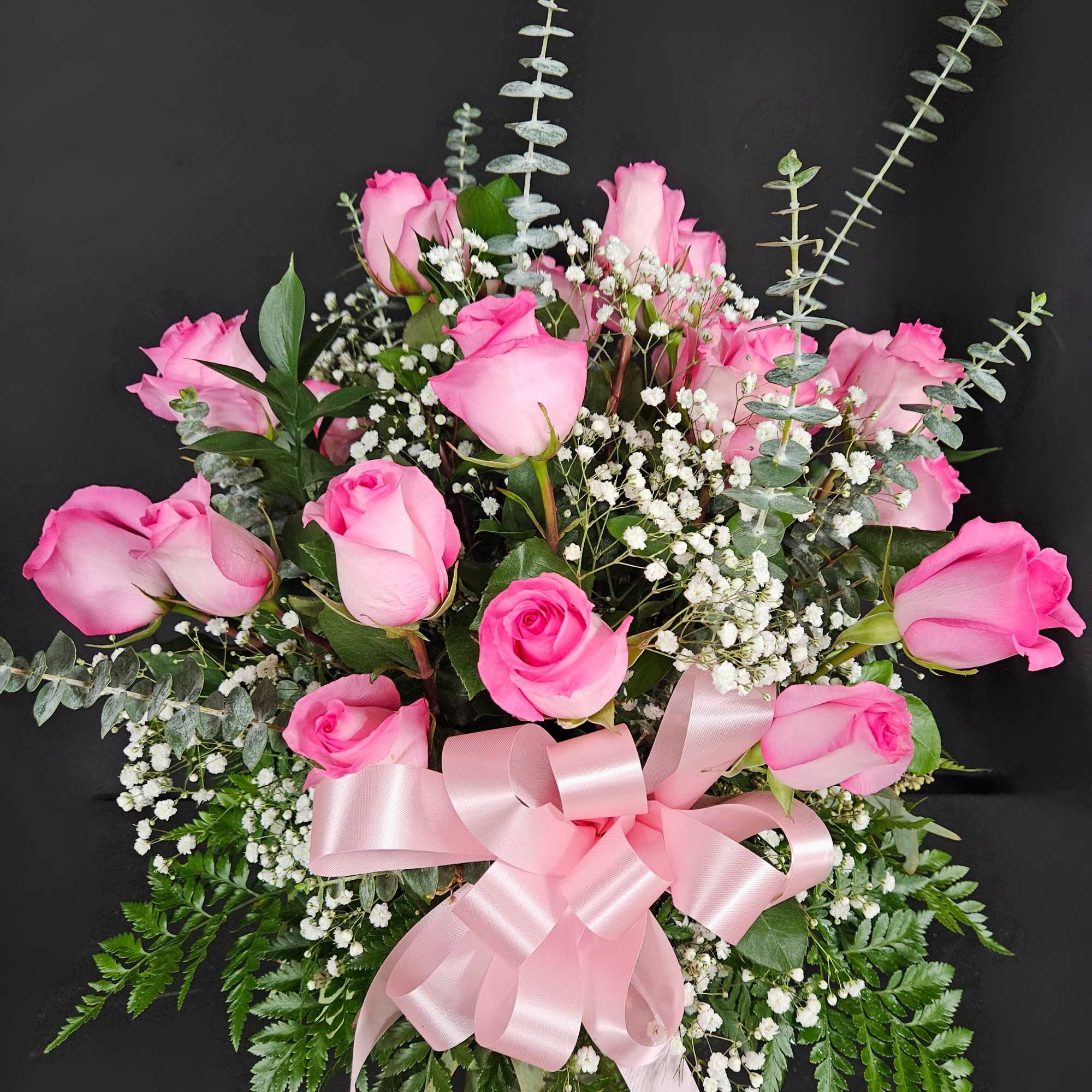 These pink roses are cheerful and fun! Dozen Long Stemmed Pink Roses