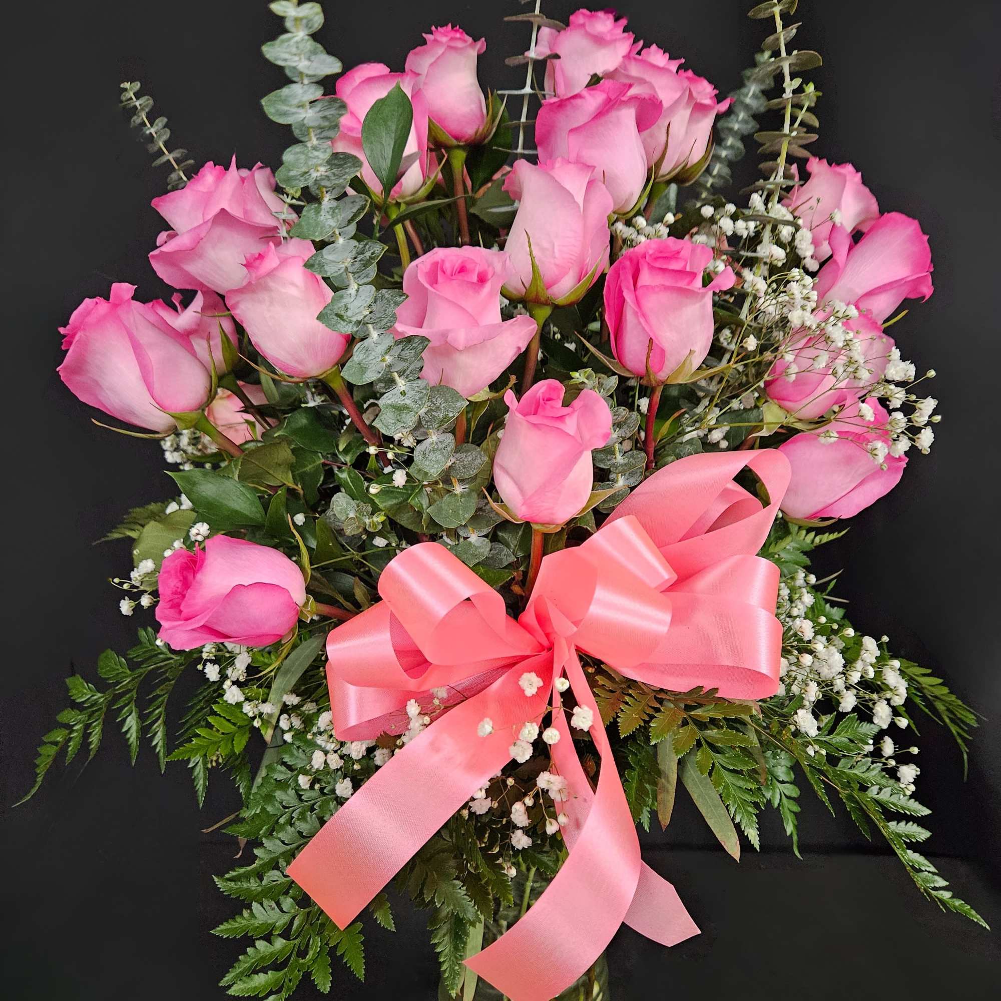 These pink roses are cheerful and fun! Dozen Long Stemmed Pink Roses