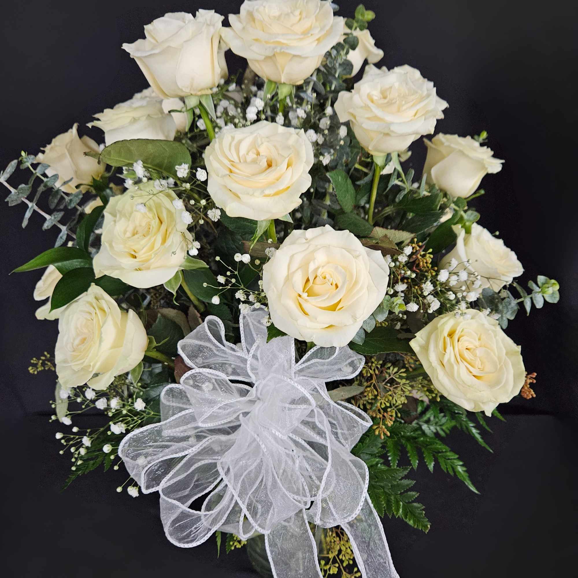 A dozen white roses are a classic gift! Perfect for Valentine's Day