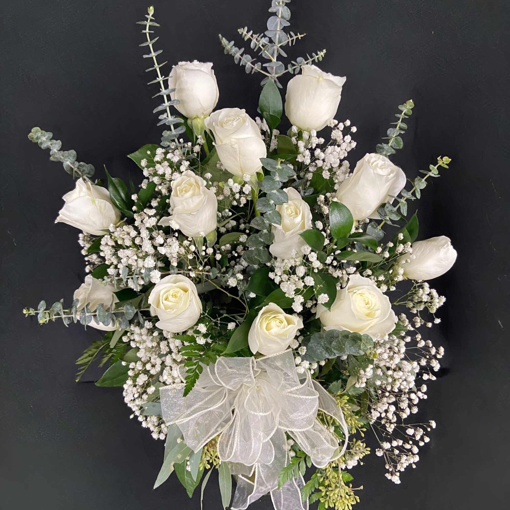 A dozen white roses are a classic gift! Perfect for Valentine's Day