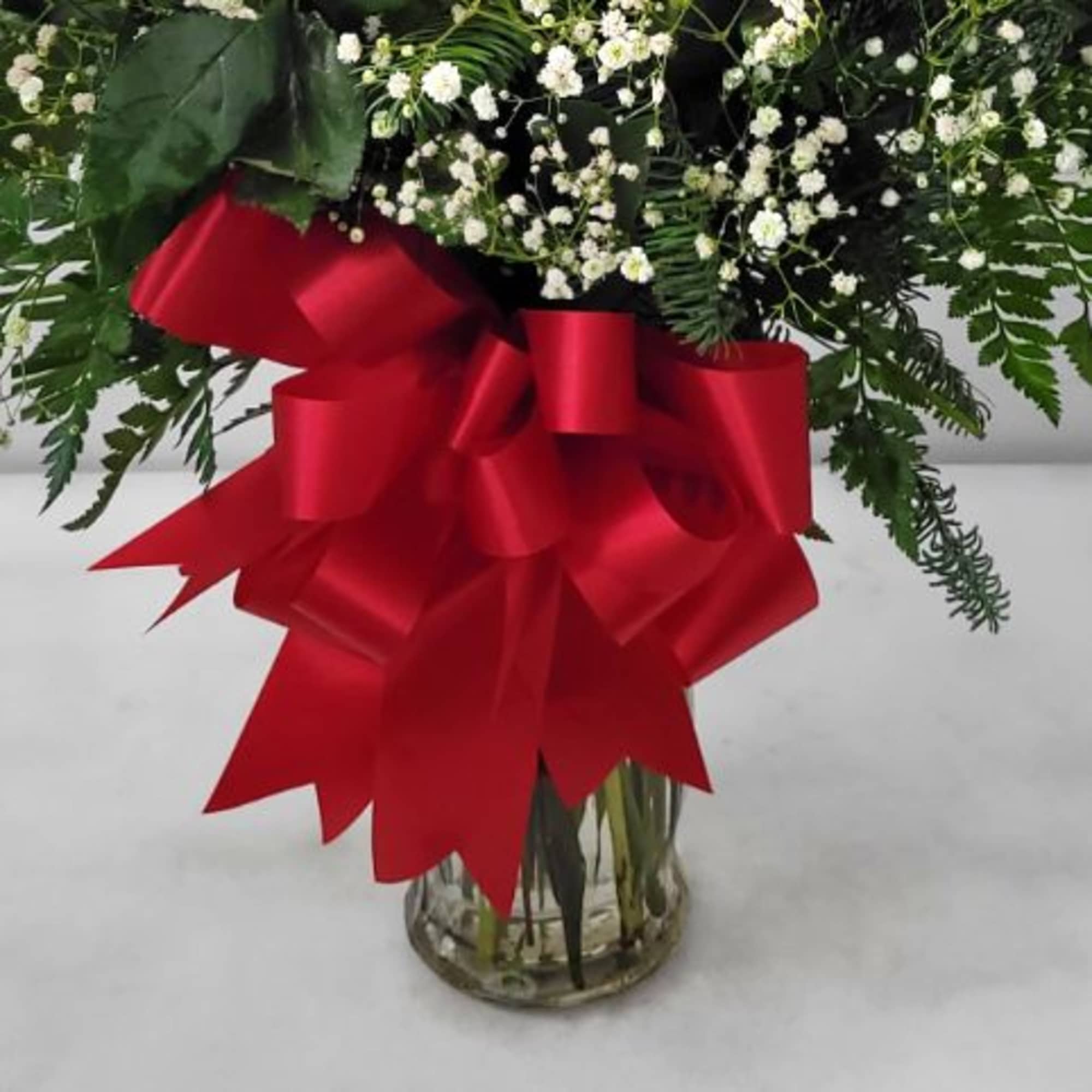 Upgrade to our Premium Classic Romance -
One (1) Dozen long stem RED