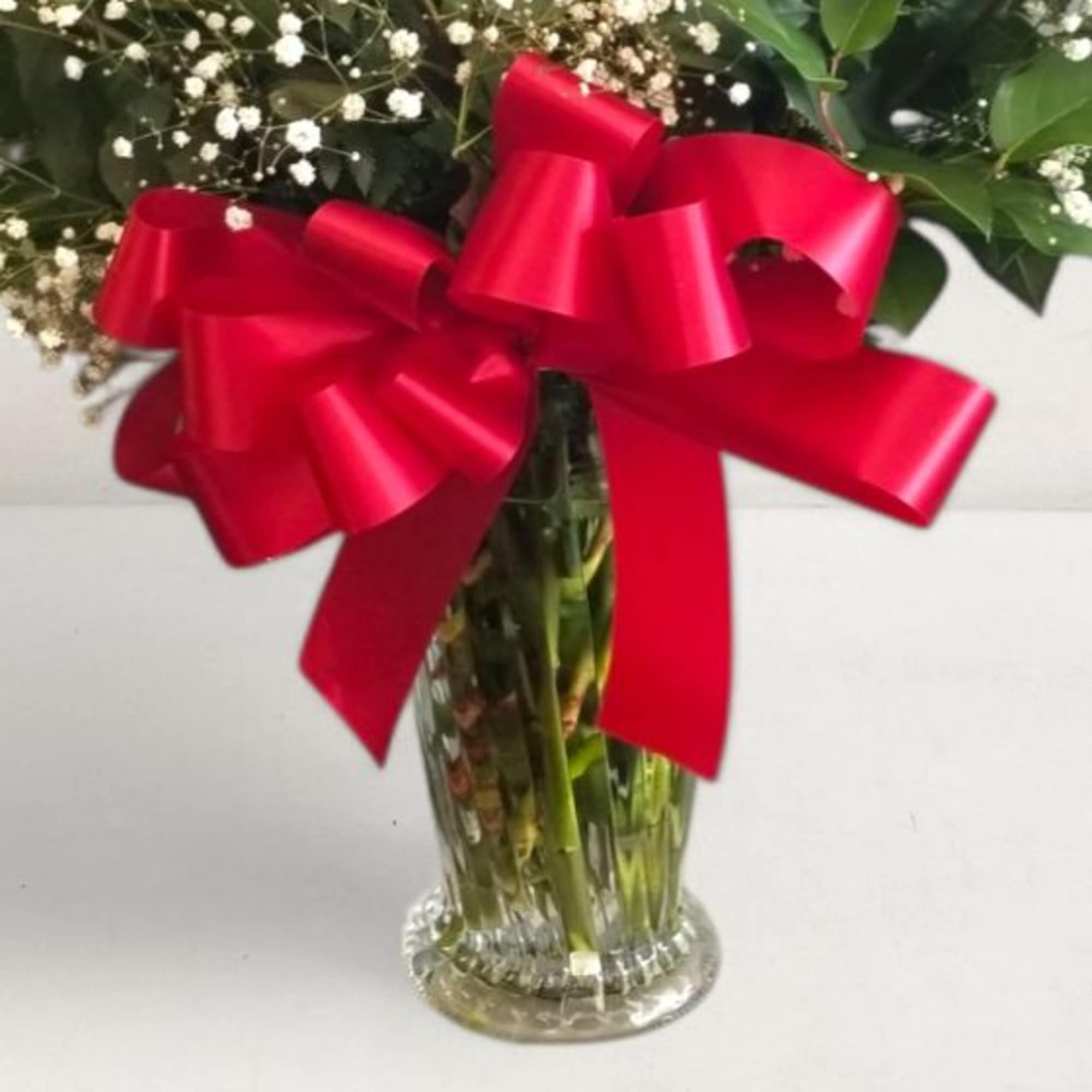 Upgrade to our Premium Classic Romance -
One (1) Dozen long stem RED