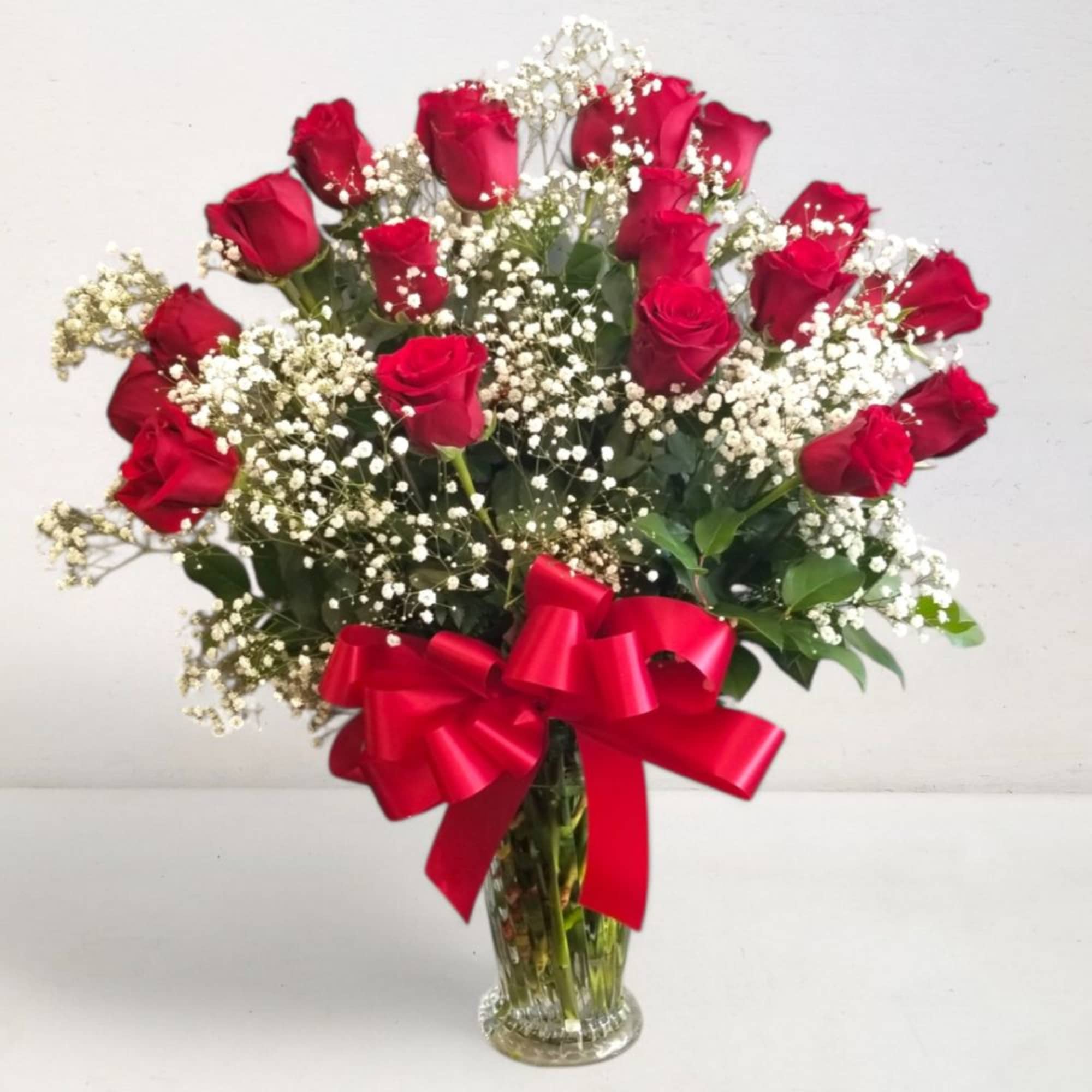 Upgrade to our Premium Classic Romance -
One (1) Dozen long stem RED