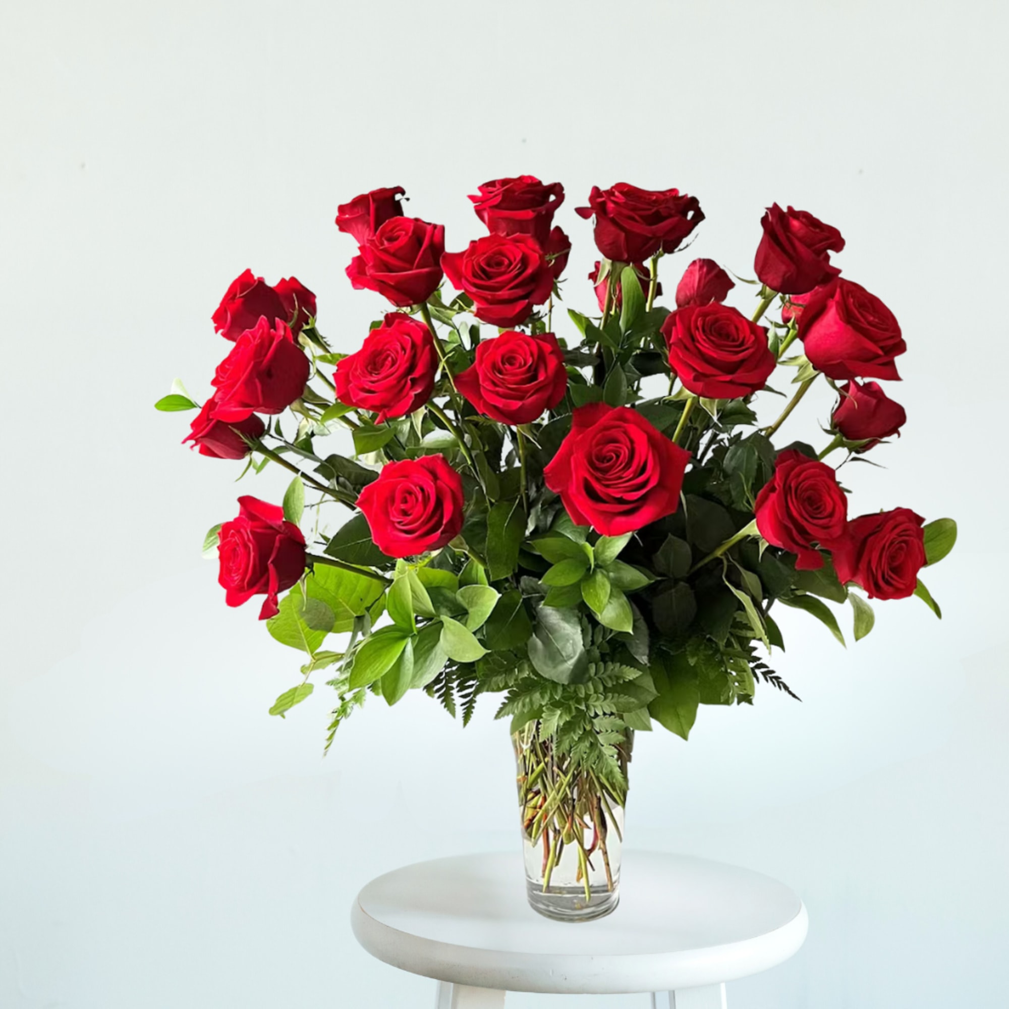Timeless, elegant, and effortlessly romantic. Our Classic Rose Vase Arrangement features fresh