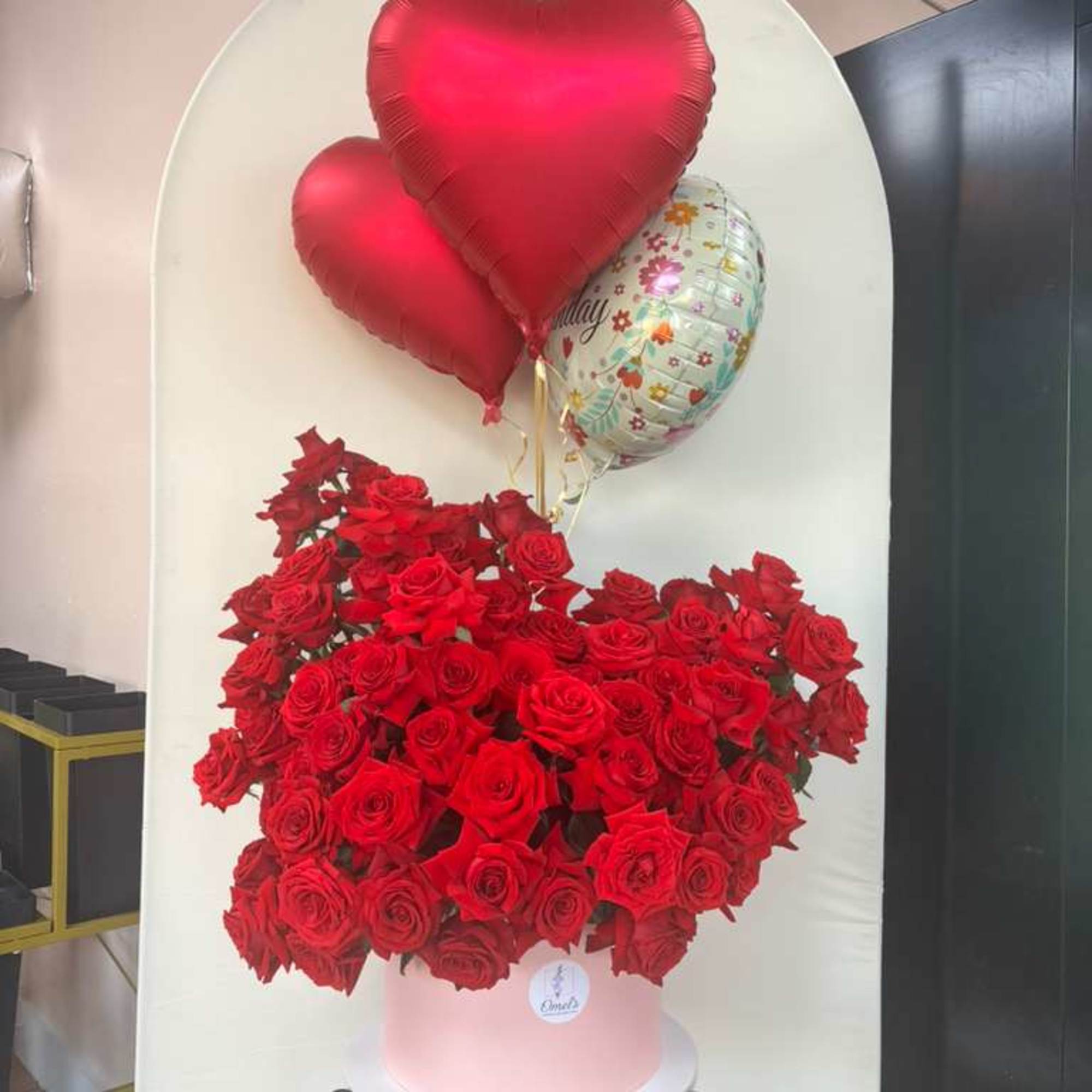 This elegant arrangement has 50 Red Roses that say, "I love you"