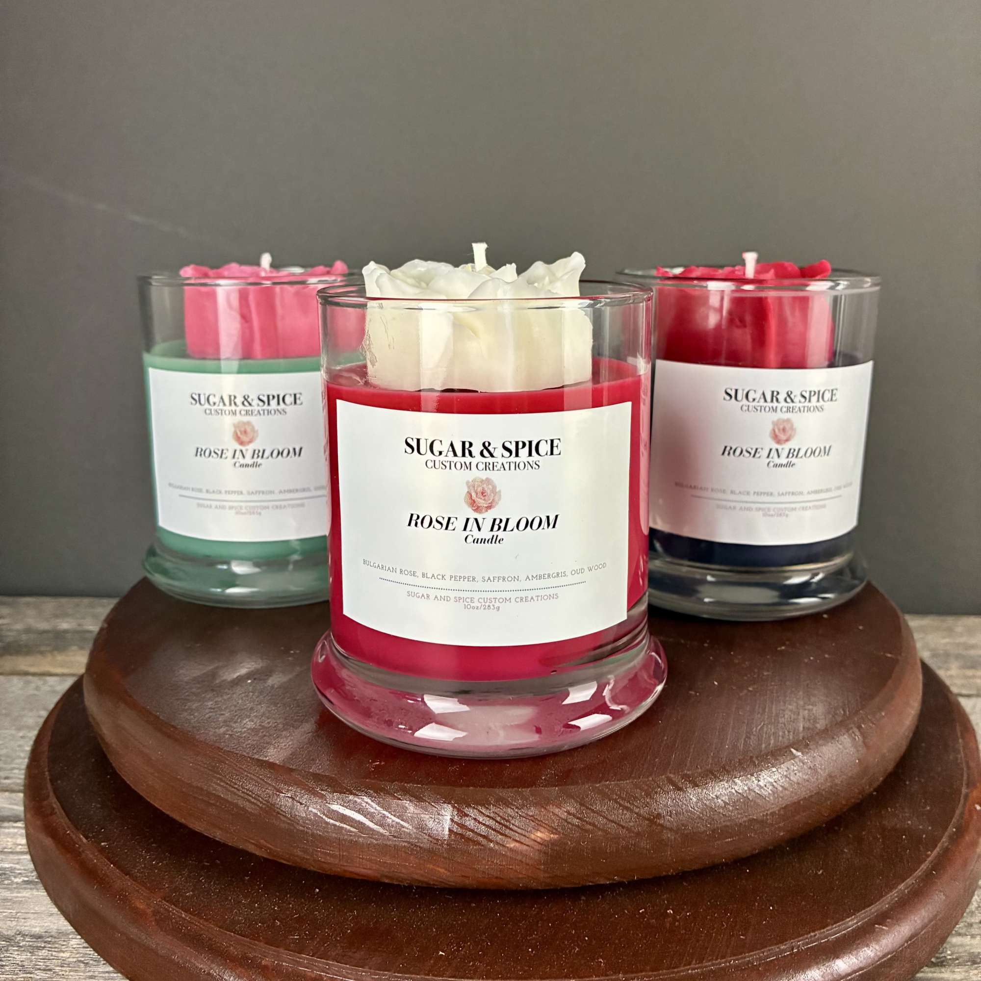 This sweet smelling candle with a hand made wax rose on top