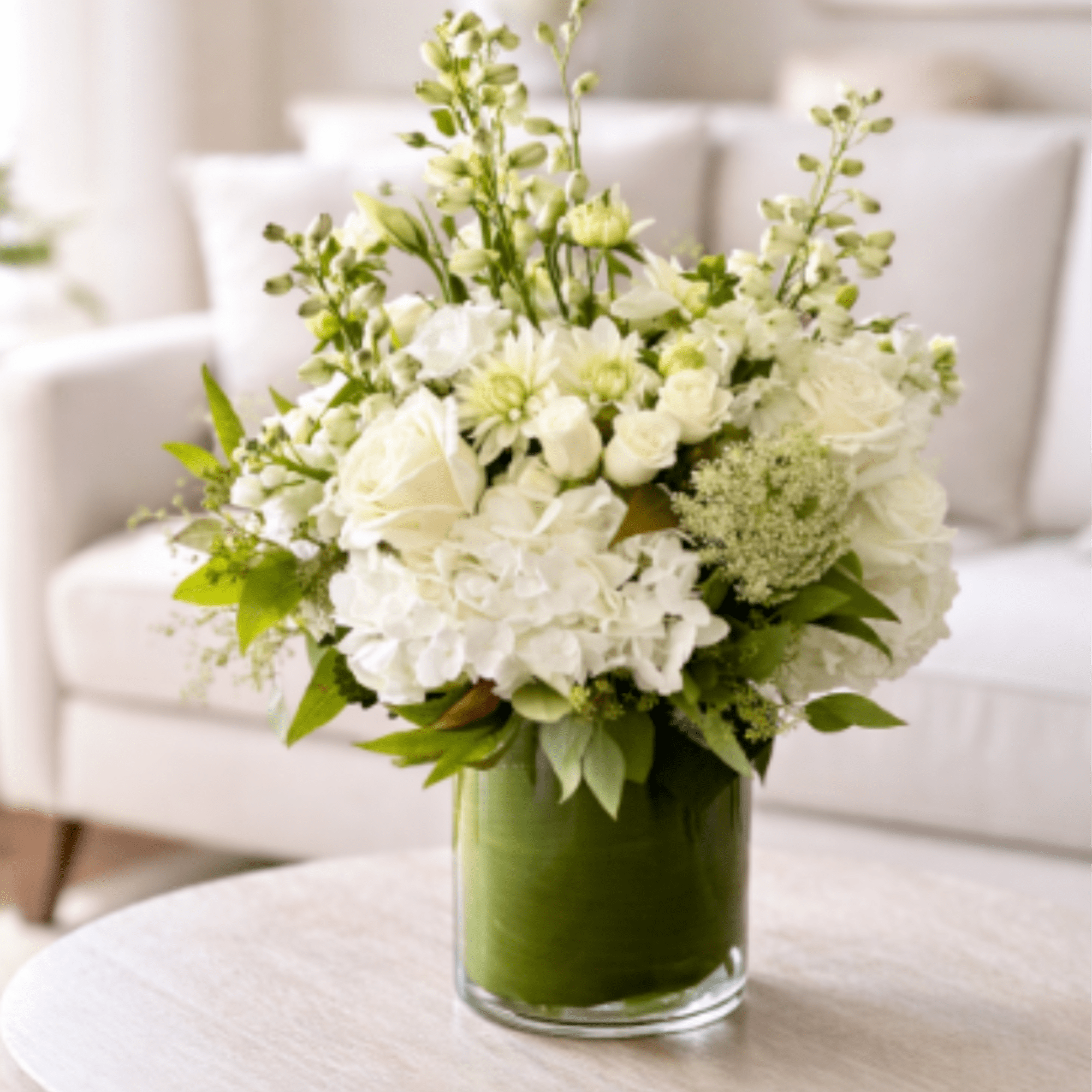 The Palos Verdes Arrangement is a mix of white and green florals