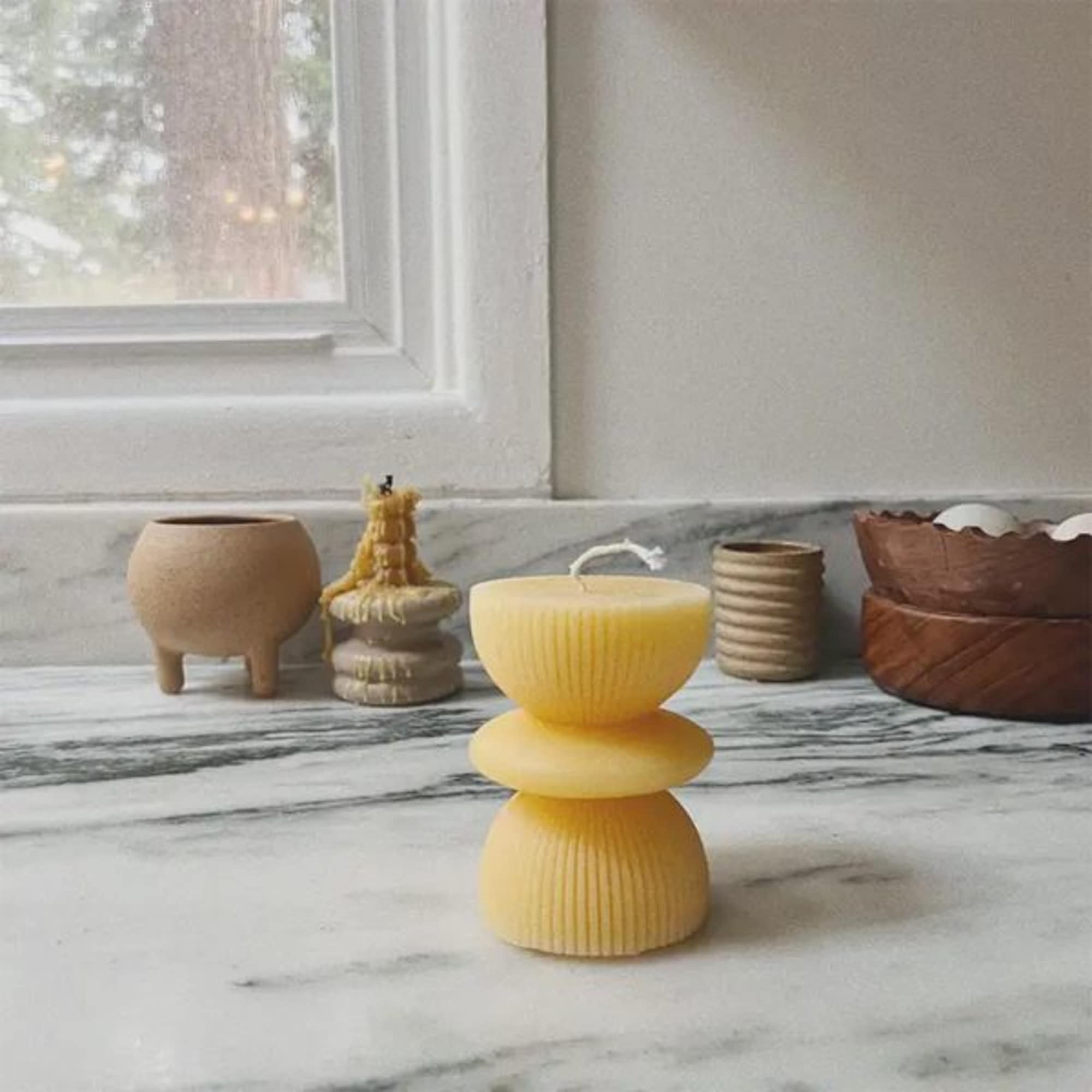 100% beeswax candle 

approximately 4.25inches tall x 3 inches wide


Please note, due