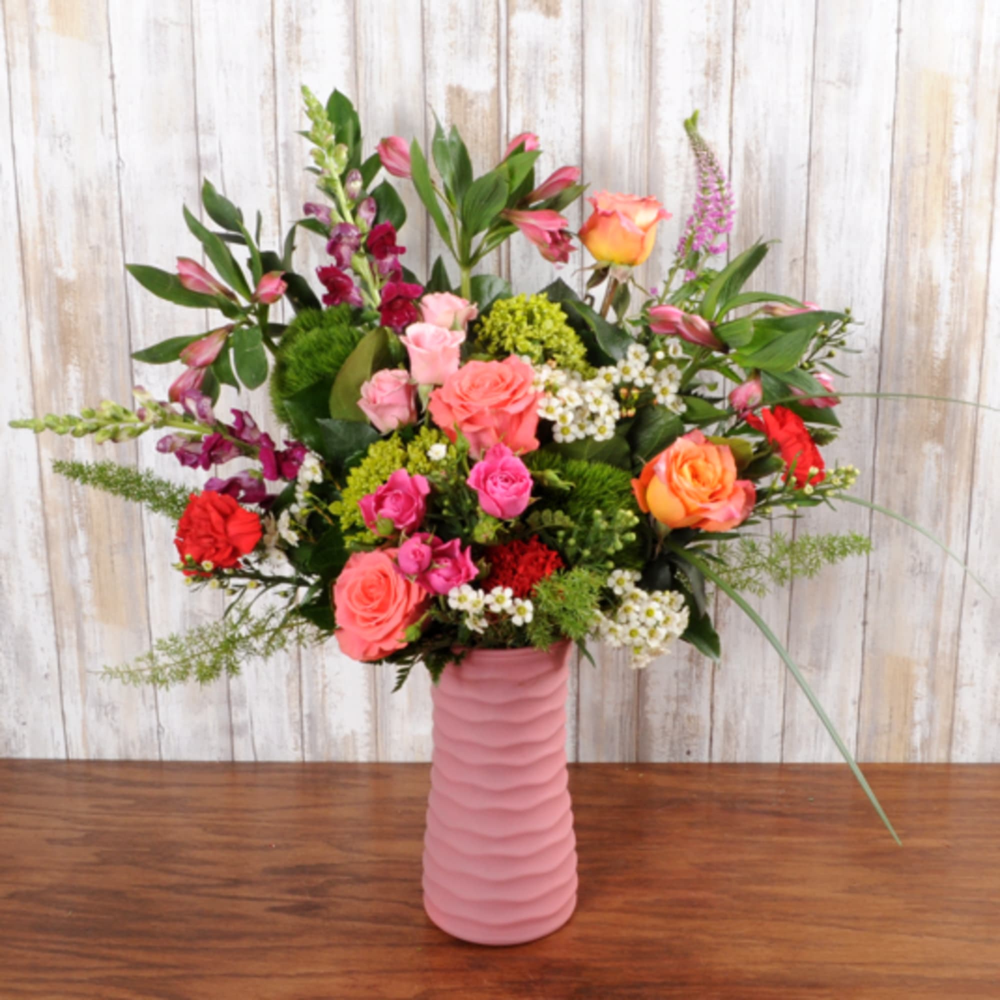 Spread good vibes with this mix of garden flowers