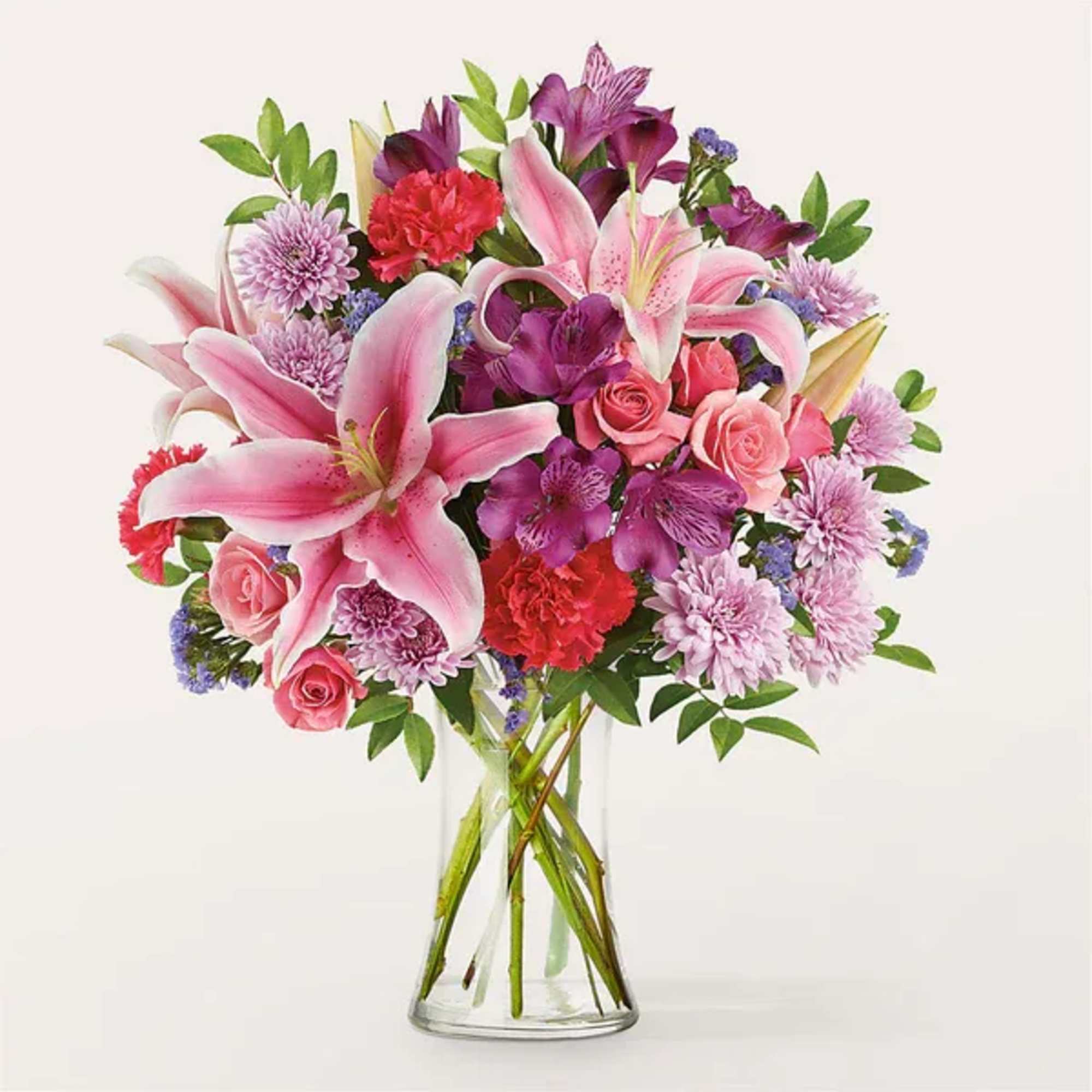 Pink lilies, carnations and spray roses will effortlessly relay your heartfelt message.