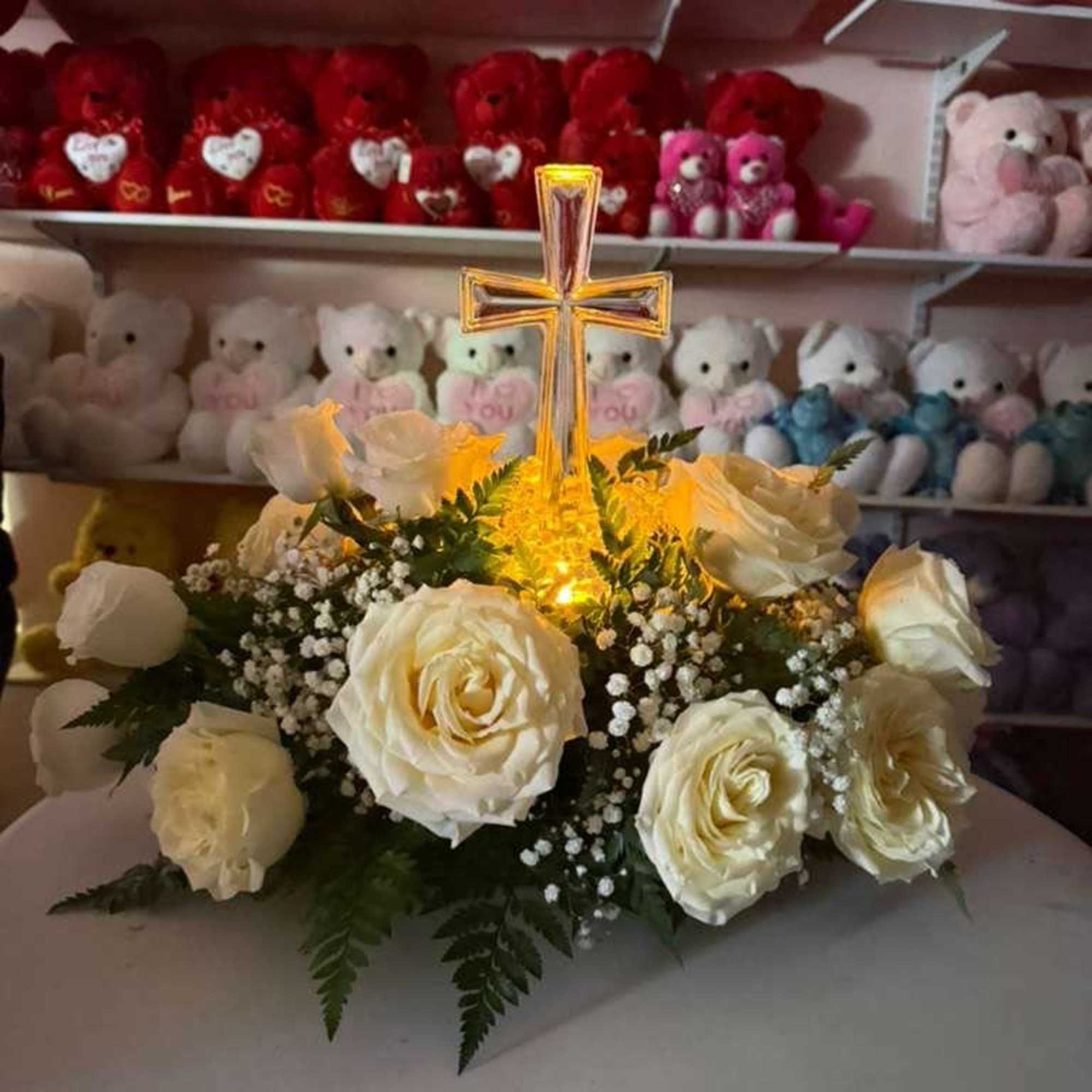 condolence arrangement with white roses