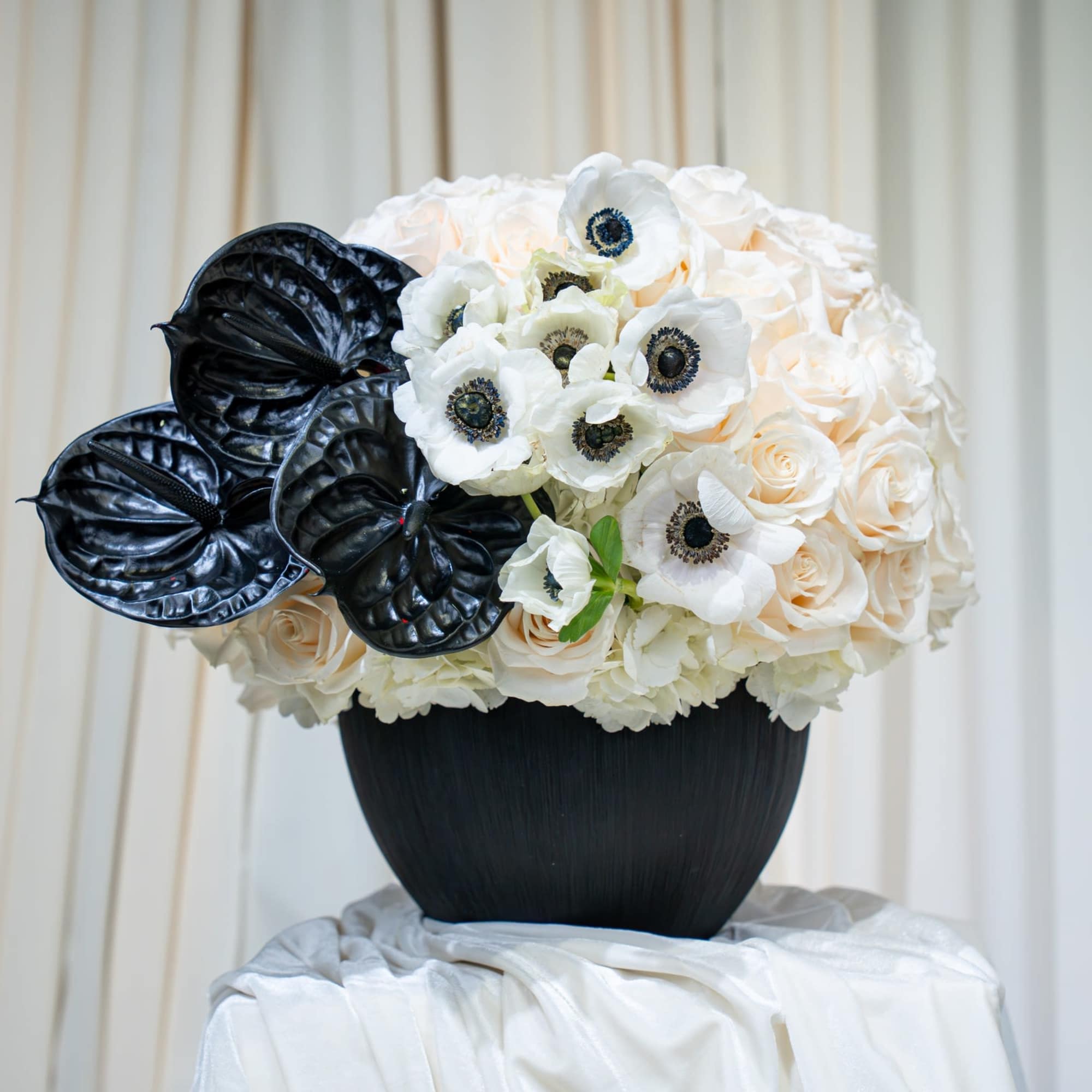 This arrangement is the perfect blend of modern edge and timeless beauty.