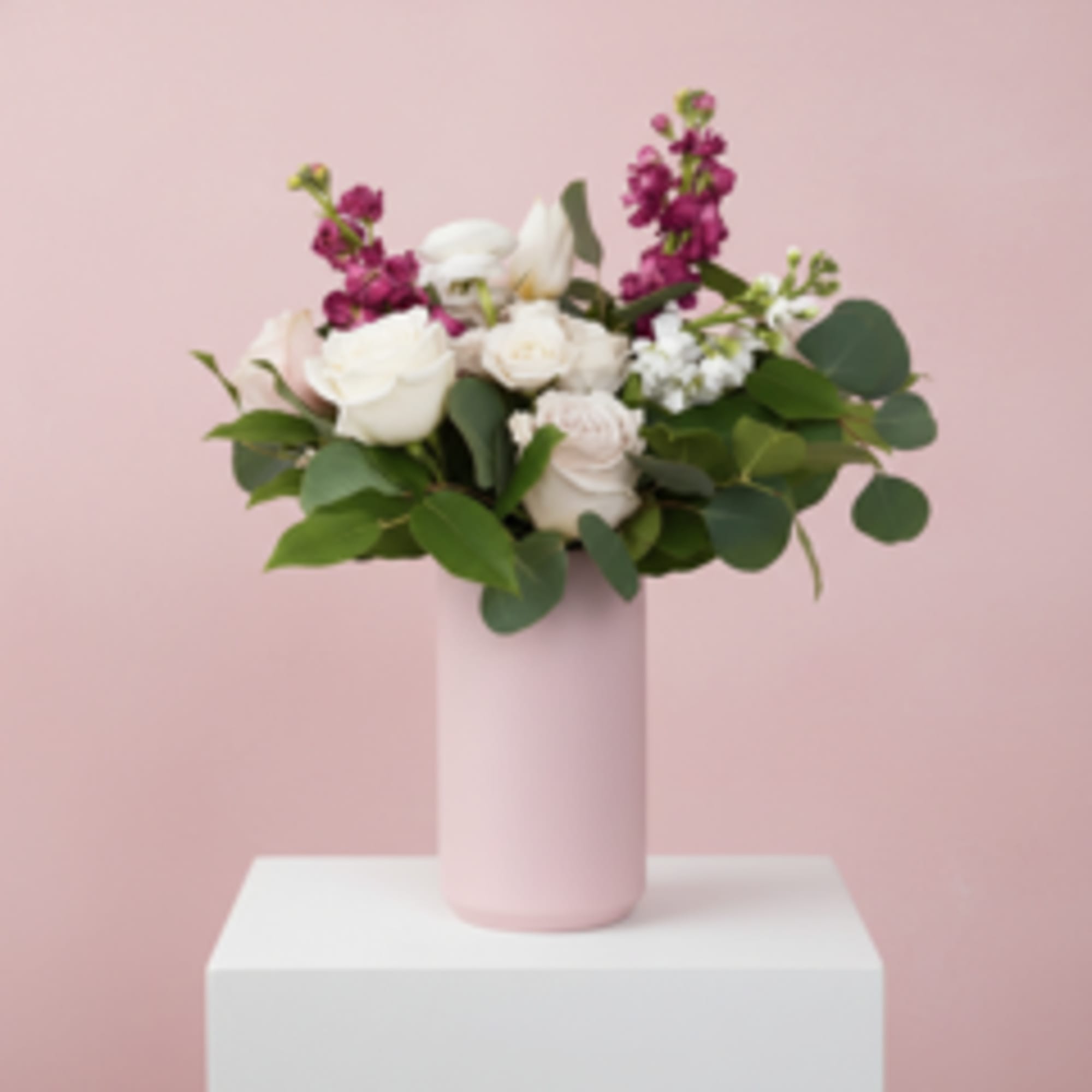 A darling Kendall Vase filled with a white, blush and neutral color