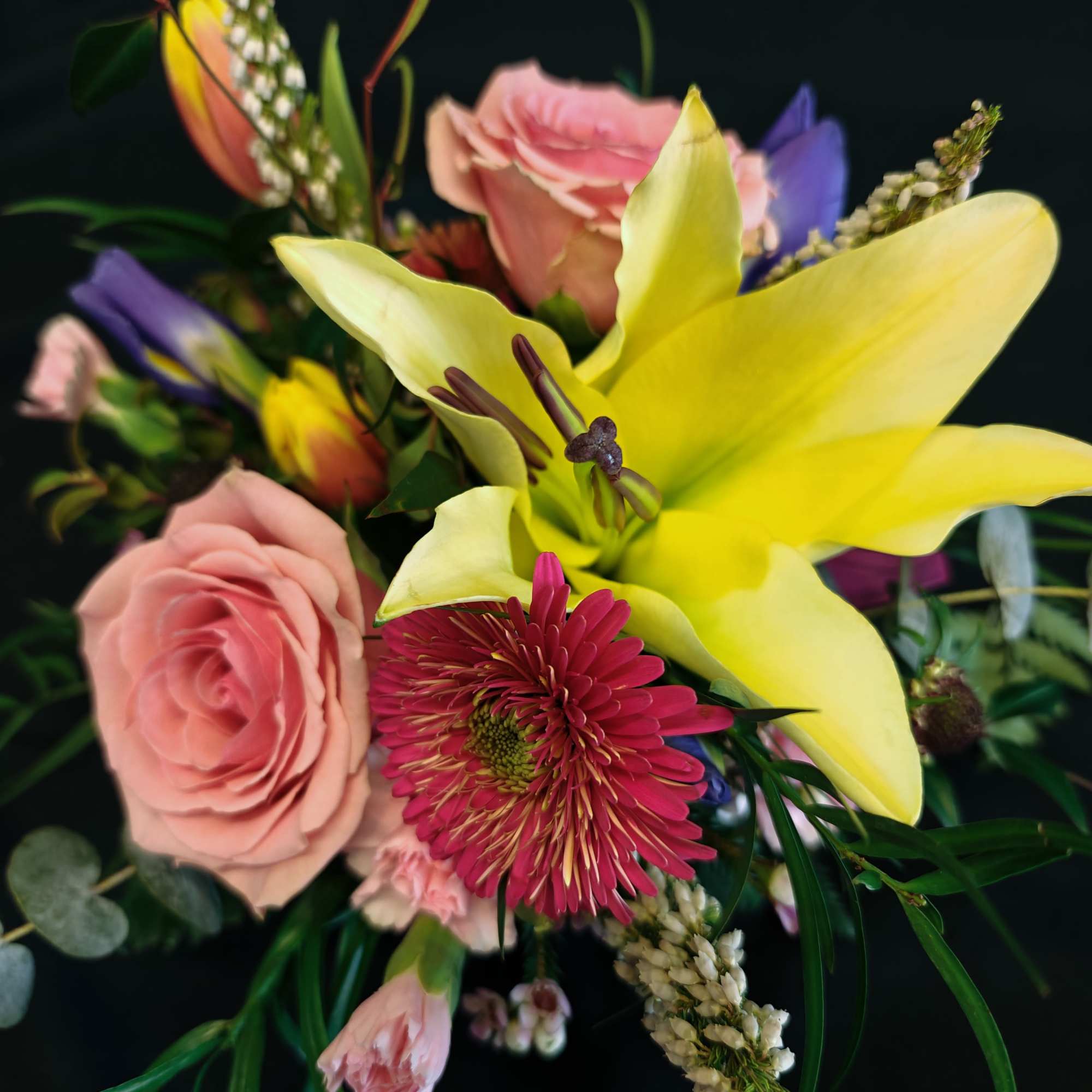 Just a handful of seasonal flowers and a nice assortment of foliage