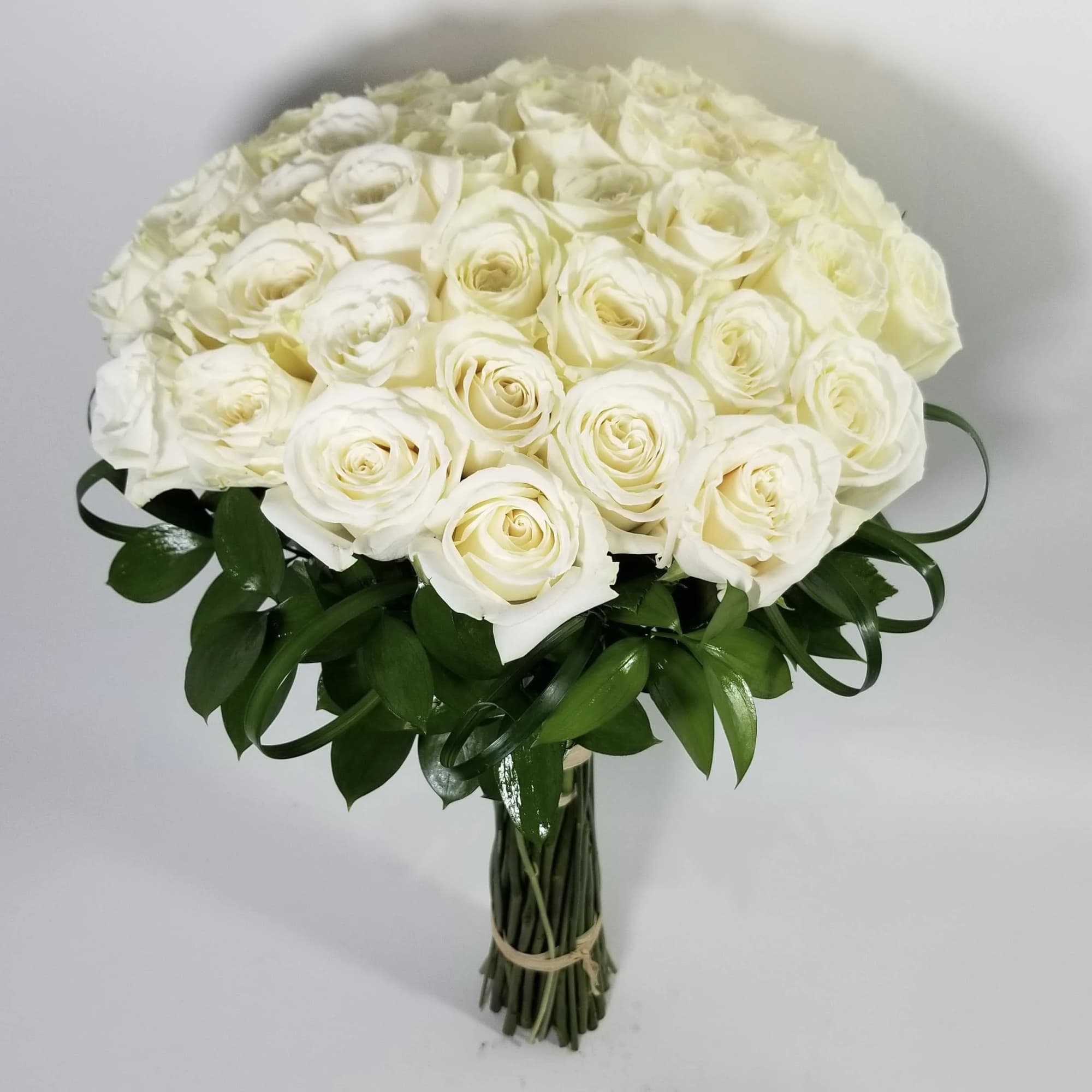 Hand tie bouquet with 18, 24 or 36 roses &amp; greenery. //