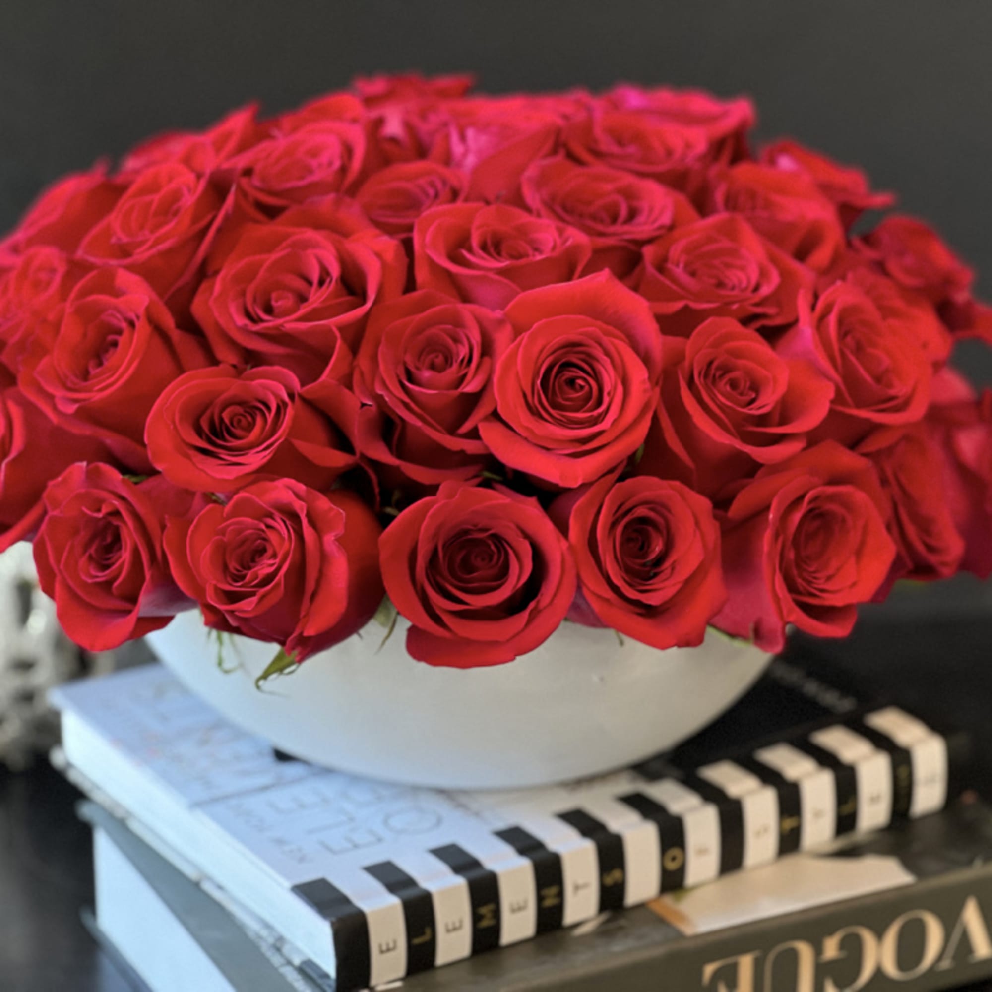 50 red roses in custom made cement vase 