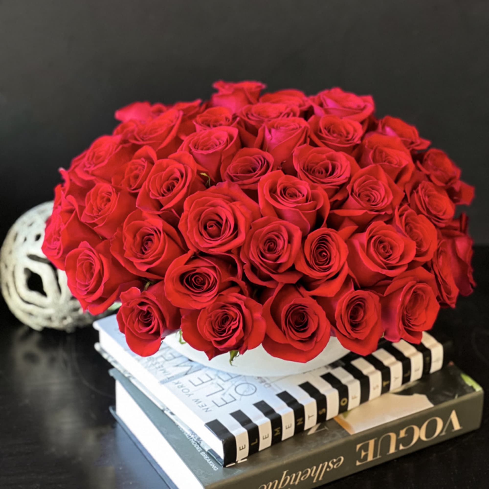 50 red roses in custom made cement vase 