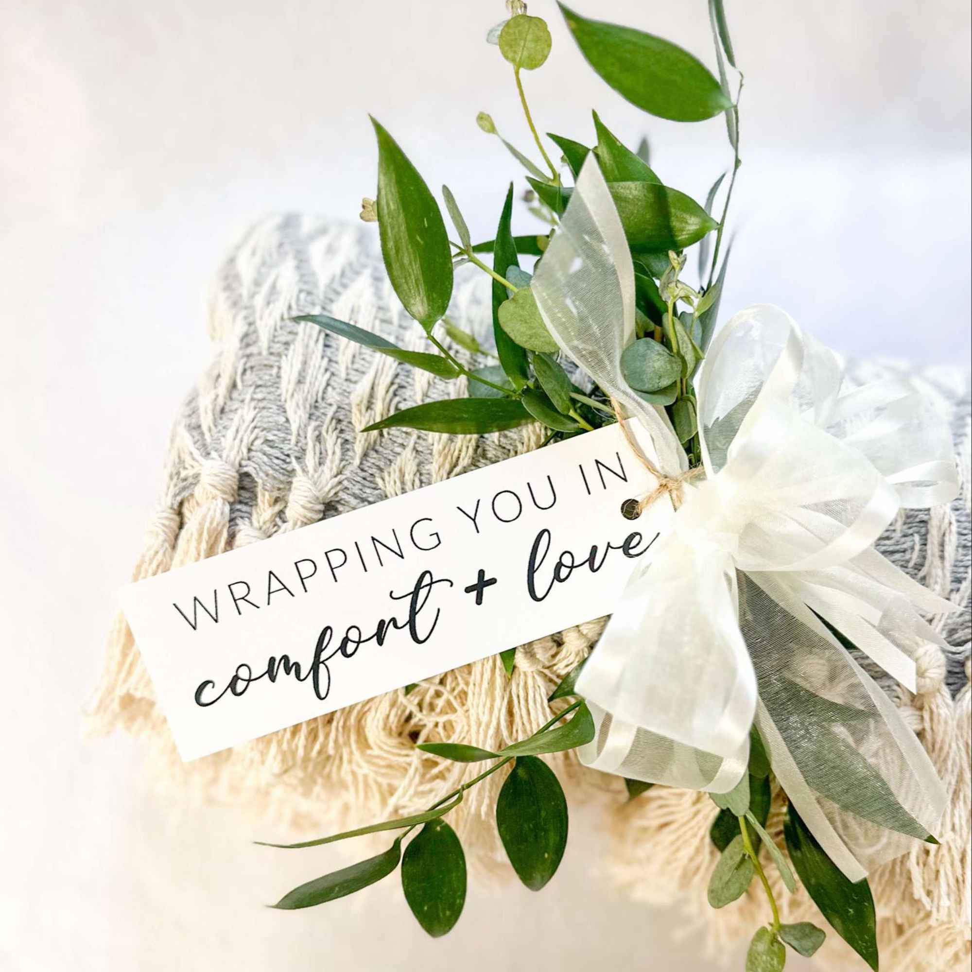 This is a 50 X 60 inch woven throw blanket adorned with