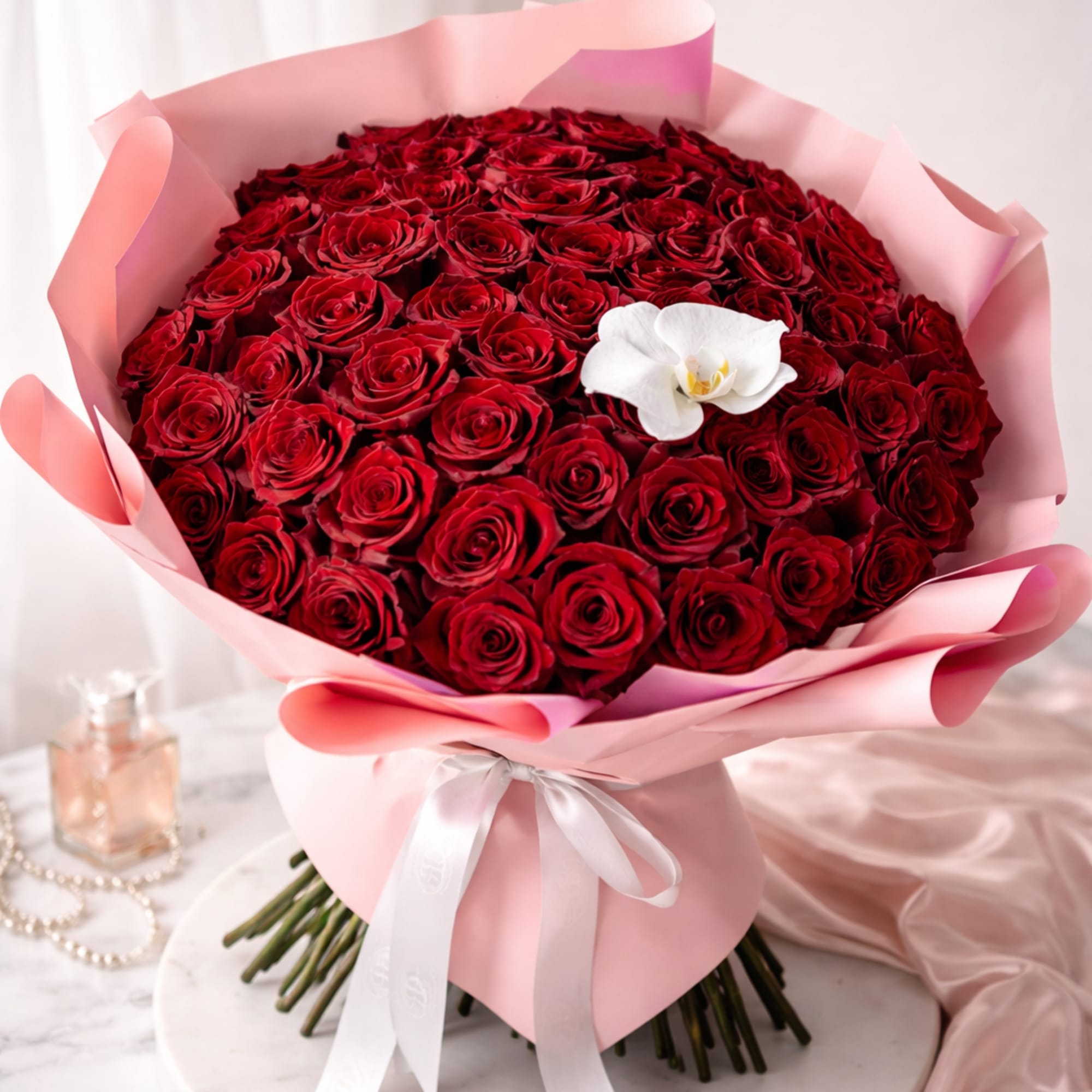Orchid Kiss (40/50/60 roses) bouquet is perfect for a romantic evening, a