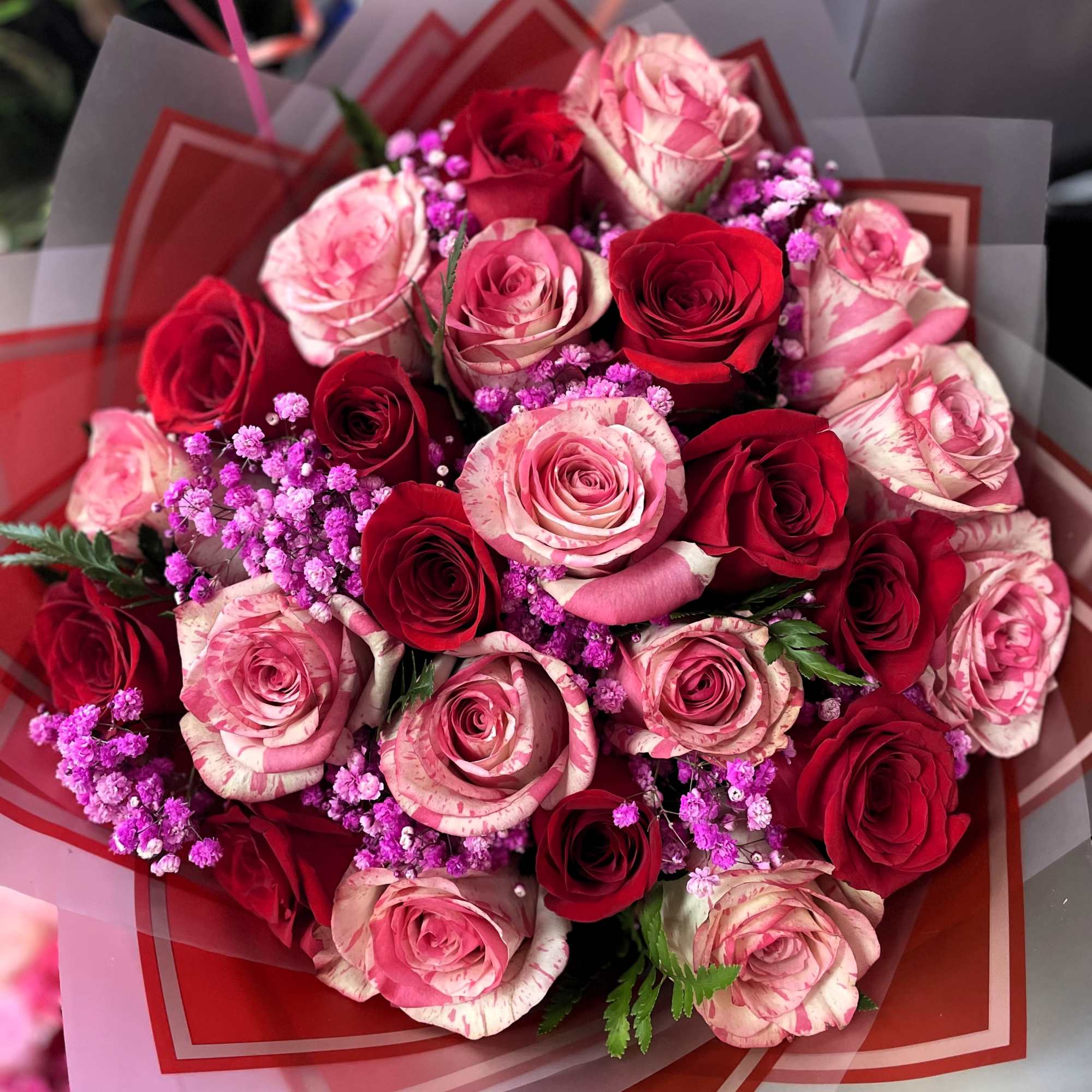 24 LONG STEM ROSES 
IF YOU WANT SPECIAL TINTED COLORS SELECT PREMIUM