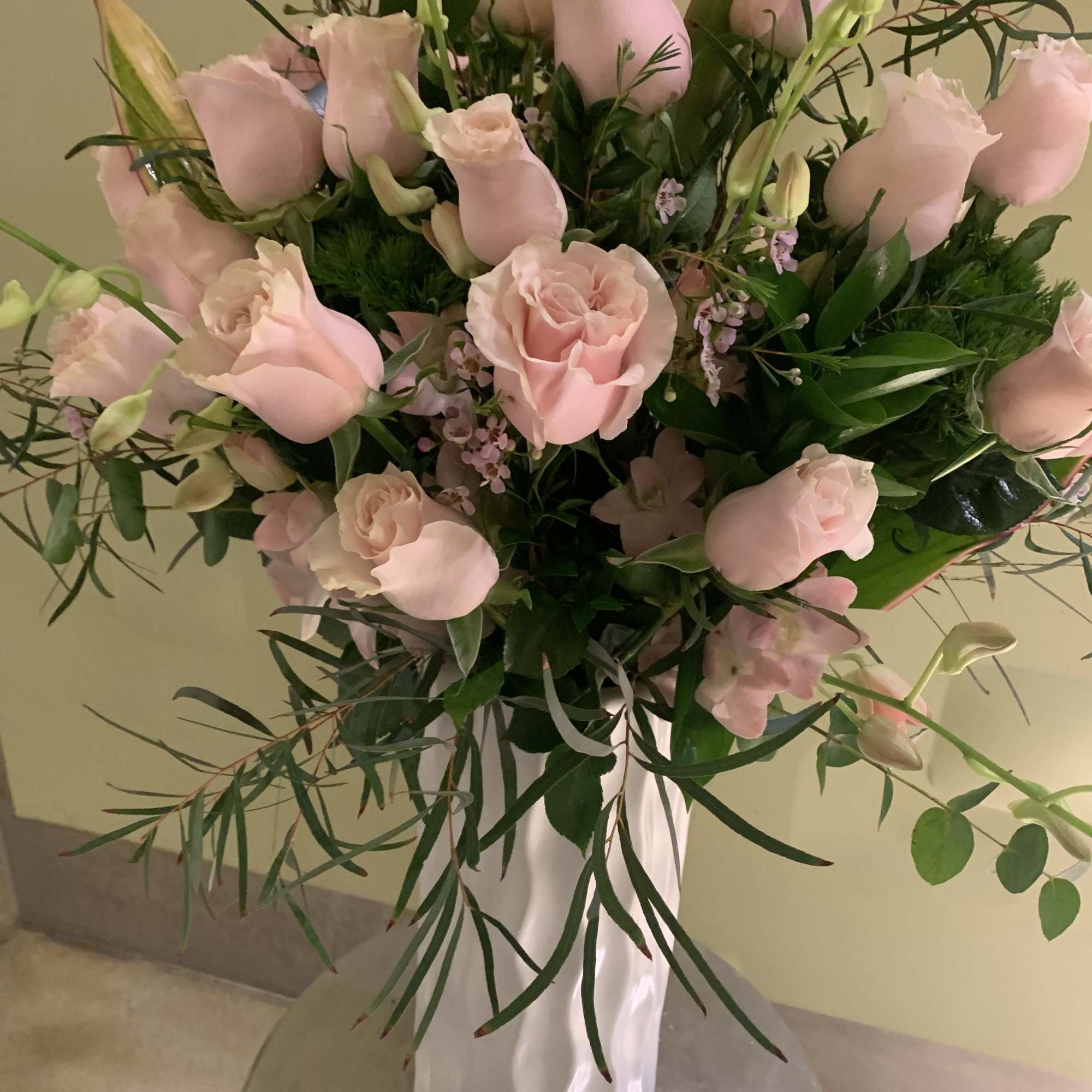 24 Premium pink roses in white ceramic modern vase  arrangement will