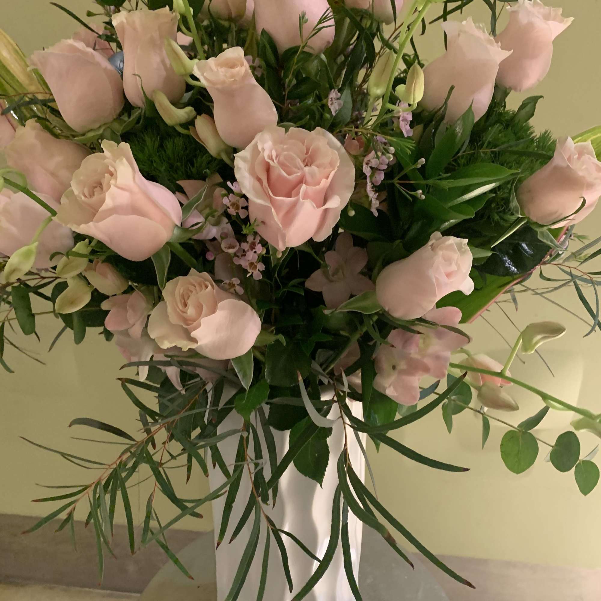 24 Premium pink roses in white ceramic modern vase  arrangement will