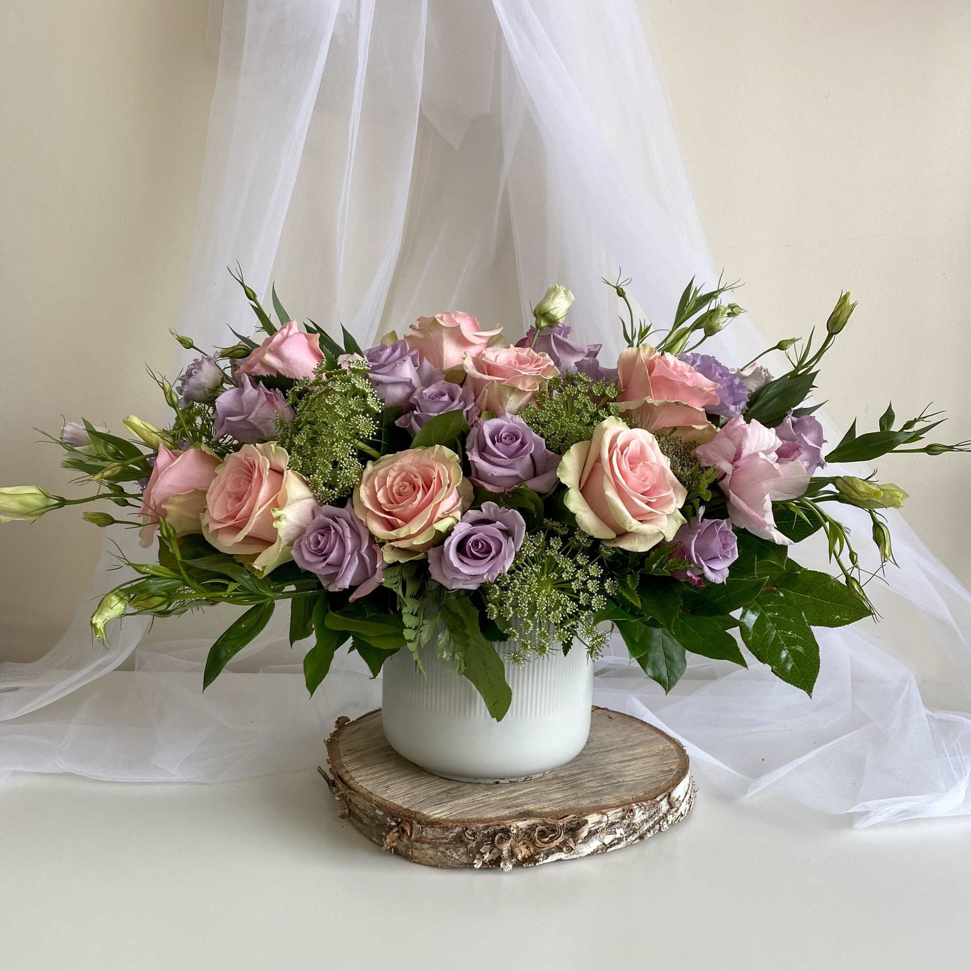 Theme Colors: Shades of pinks and purples

Featured Blooms: Roses, Spray Roses with