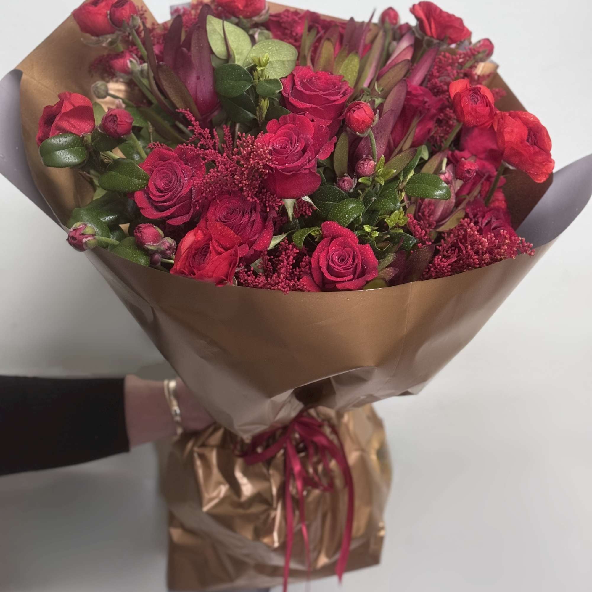  Express your heartfelt emotions with this captivating red bouquet of Red