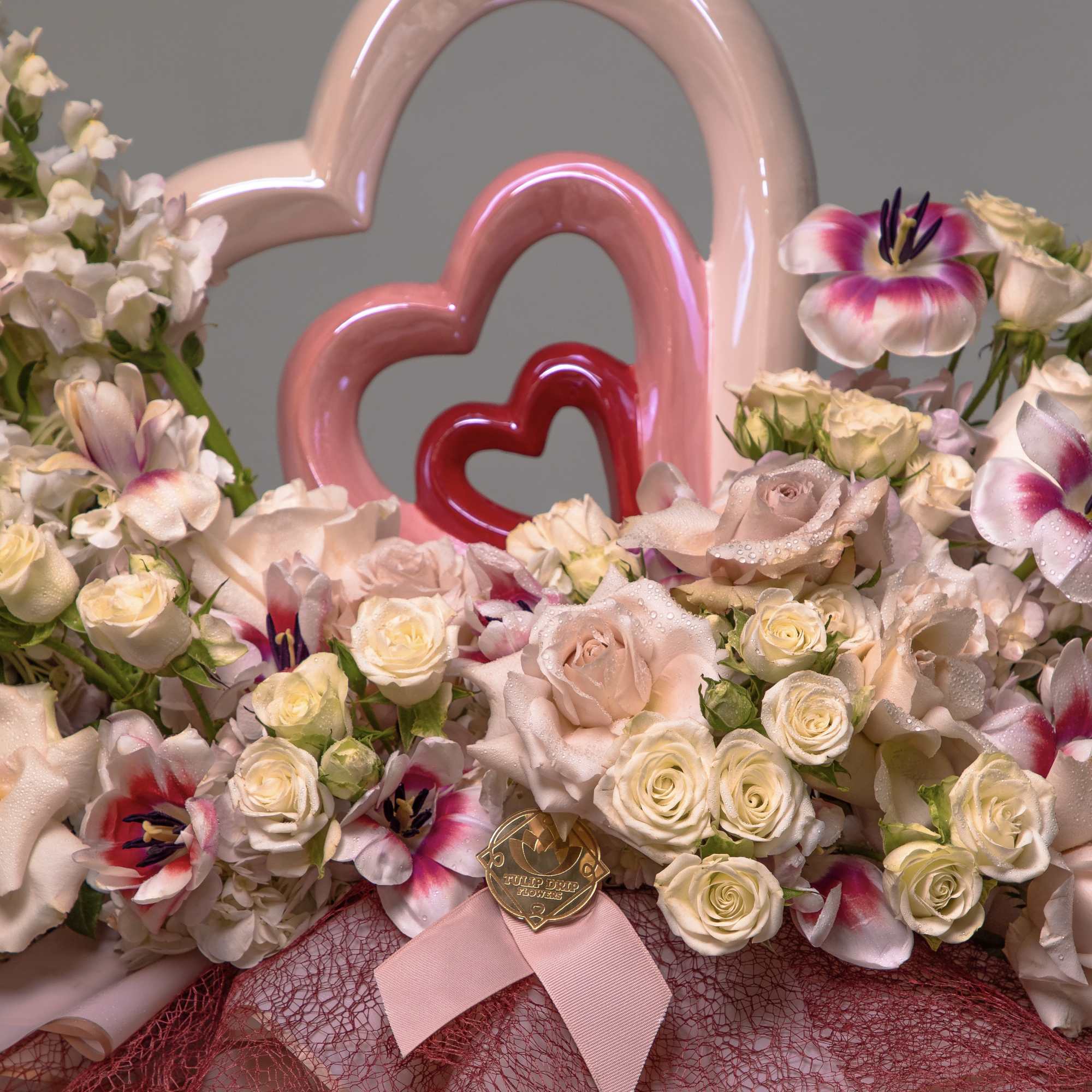 Roses, Spray Roses, Tulips, Snapdragons and a ceramic 3 colors heart in