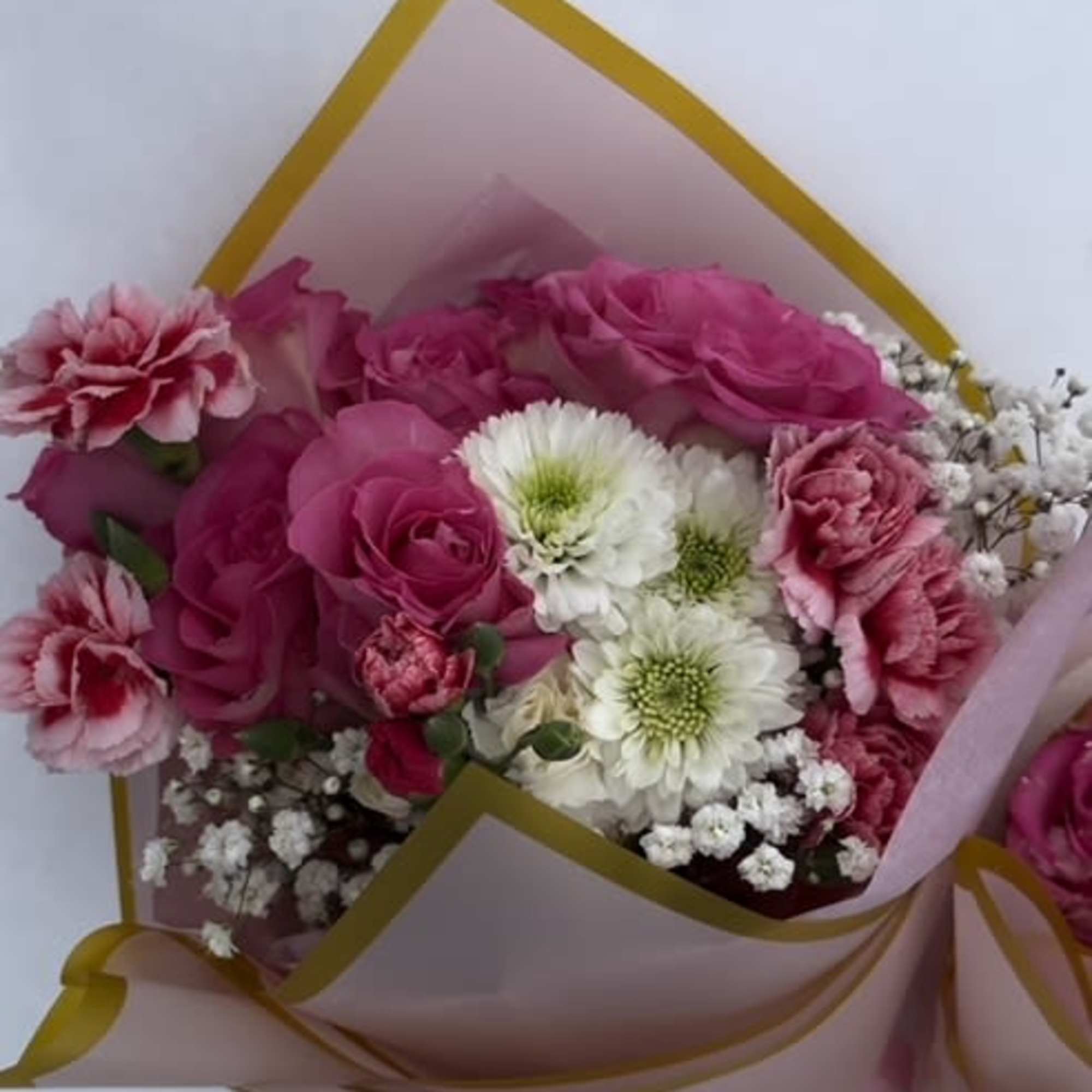 A sweet bundle of blooms perfectly picked for Valentine's Day.  A